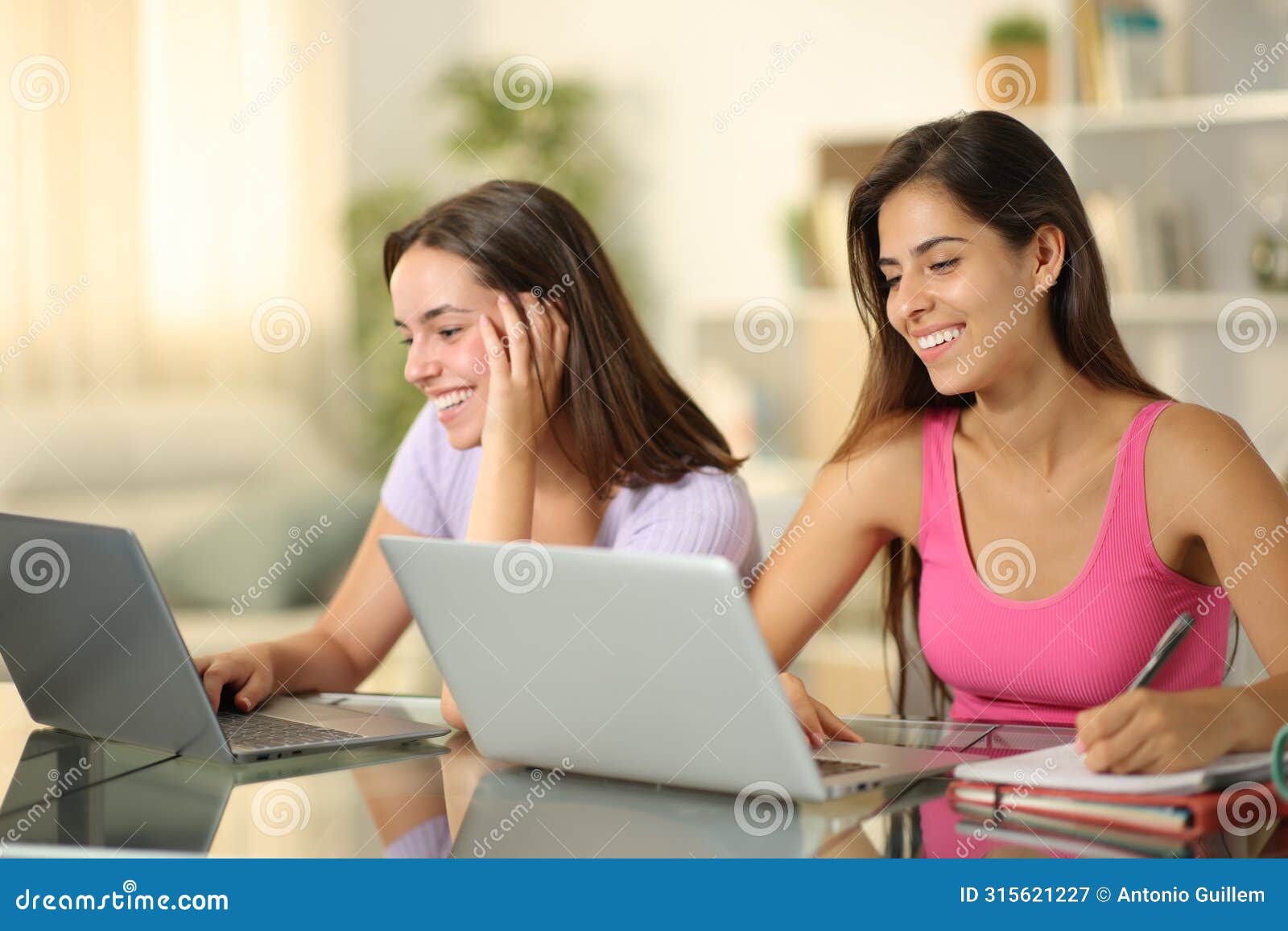 happy students learning online at home