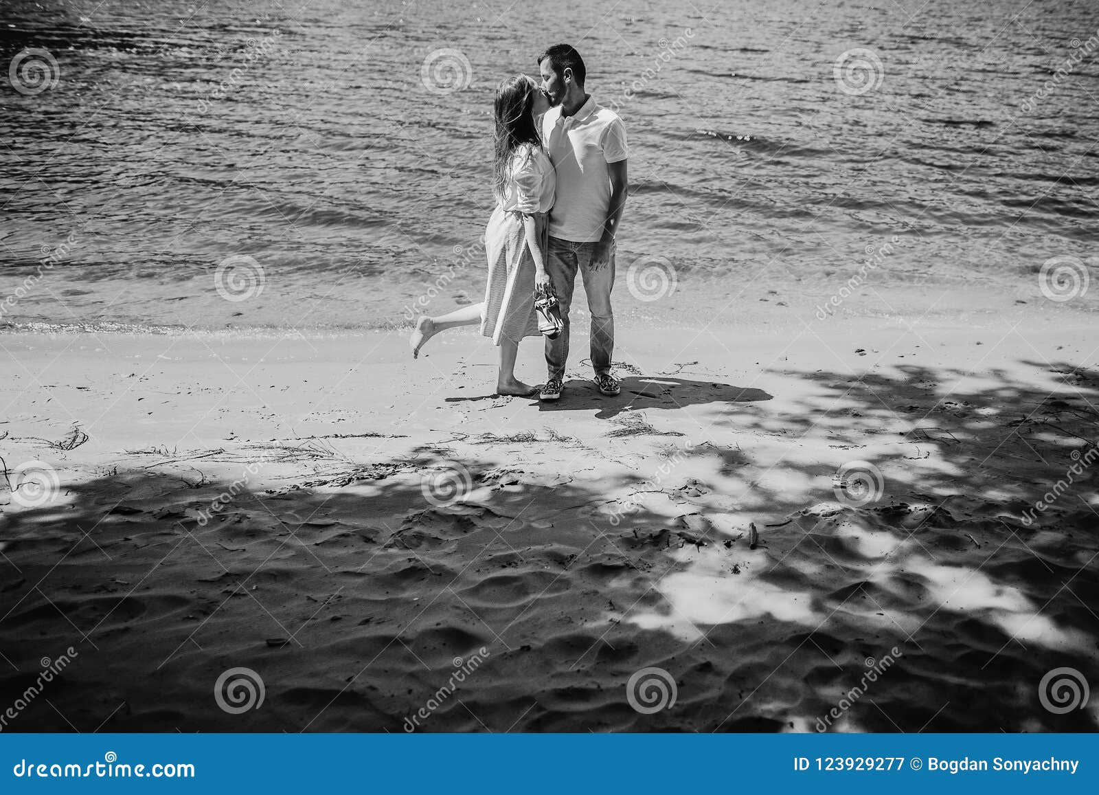 Happy Stylish Couple In Love Kissing On The Beach In Summer City Stock Image Image Of Hugging