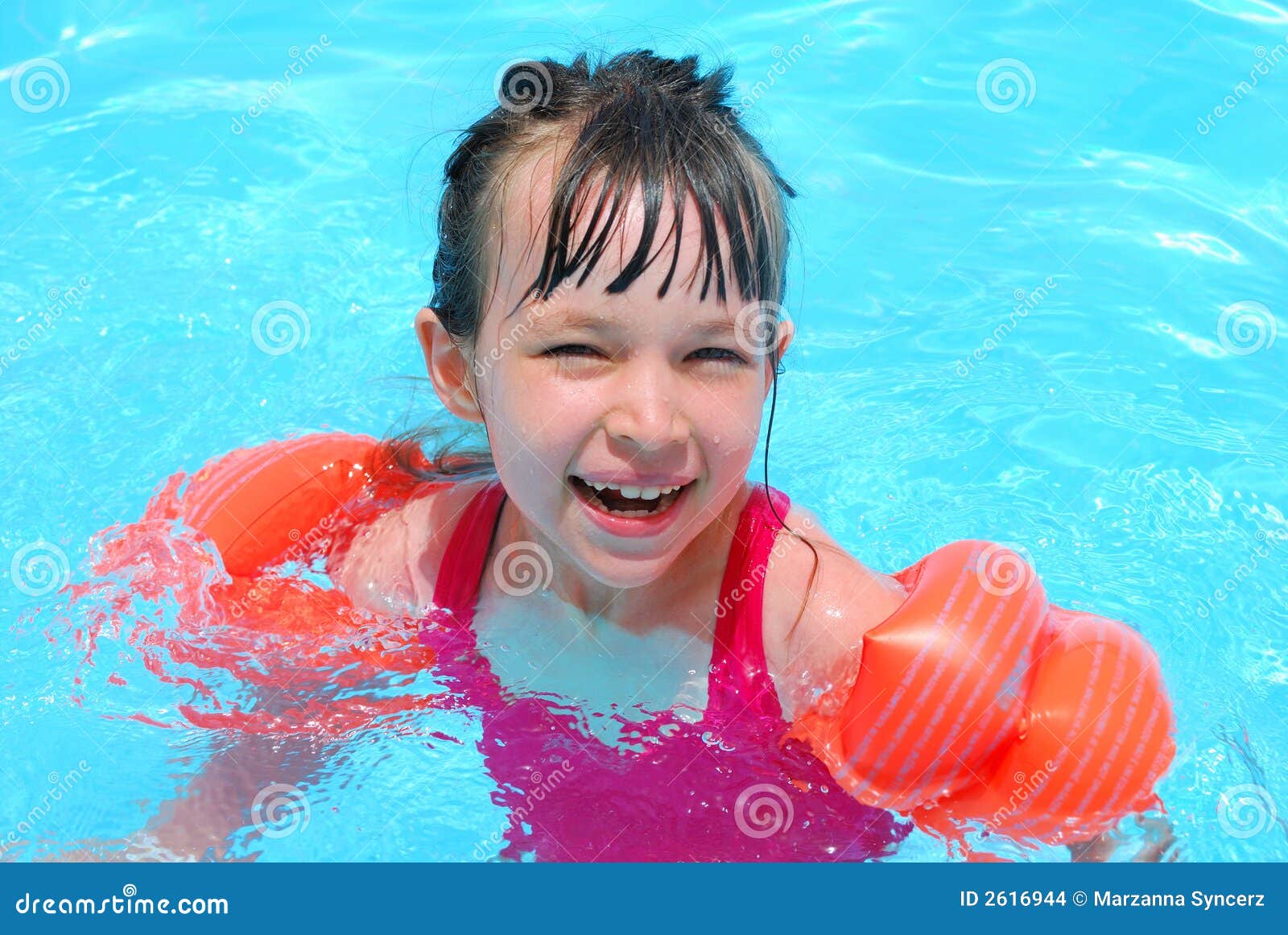 Happy Boy In Swimming Pool Standing At The Edge RoyaltyFree Stock