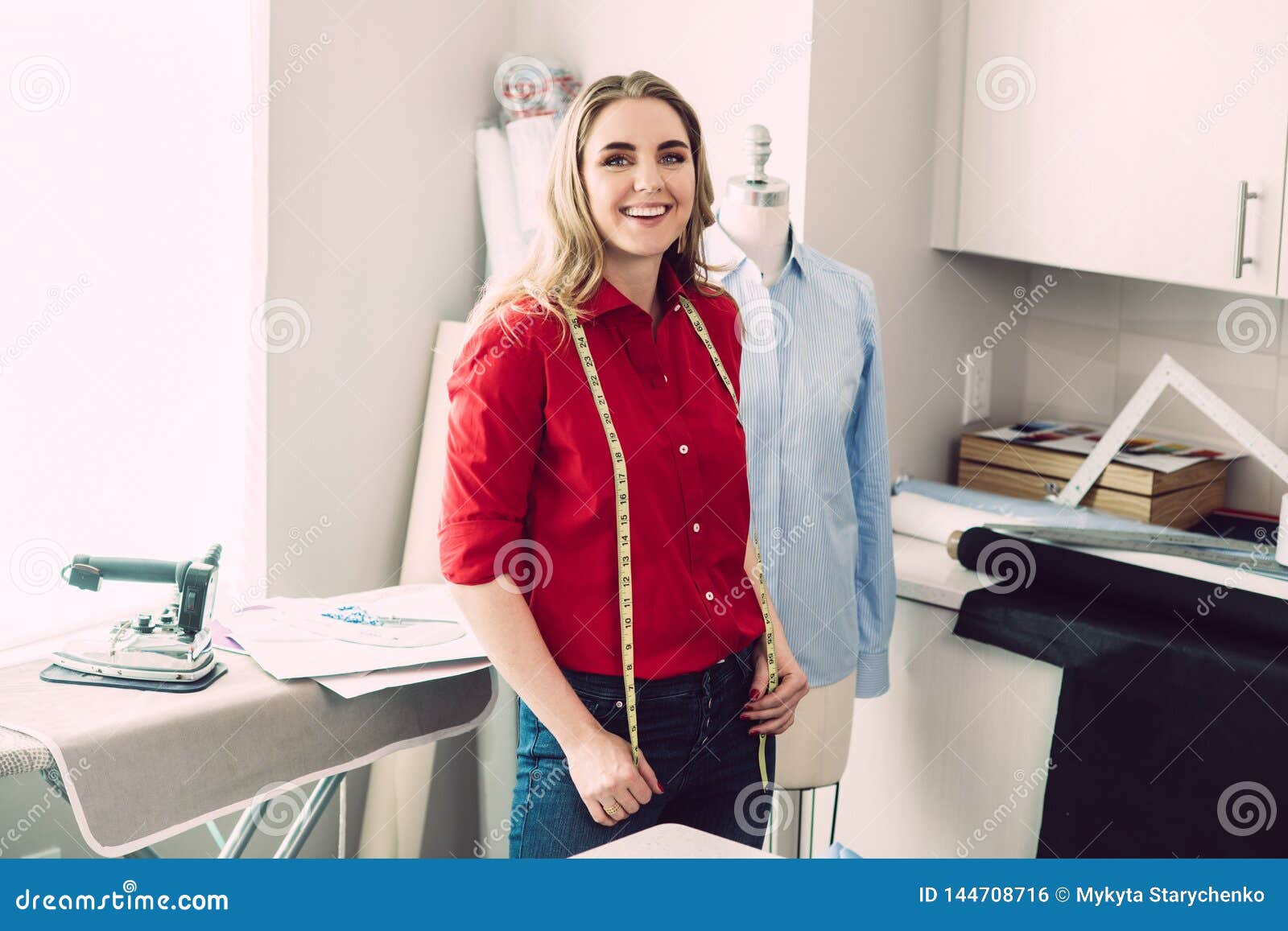 Happy Tailor Woman with Mannequin with Measuring Line in the Atelier ...