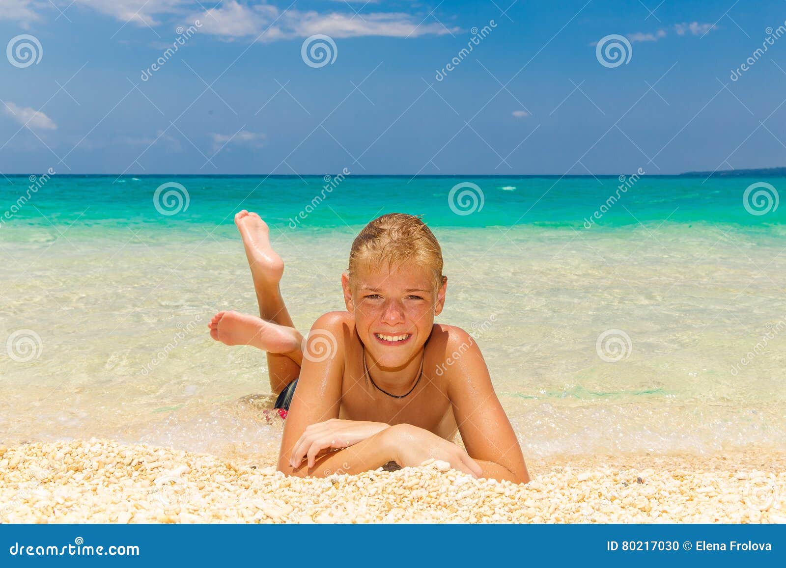 Happy Teen Boy Relaxing on the Beach. Tropical Sea in the ...