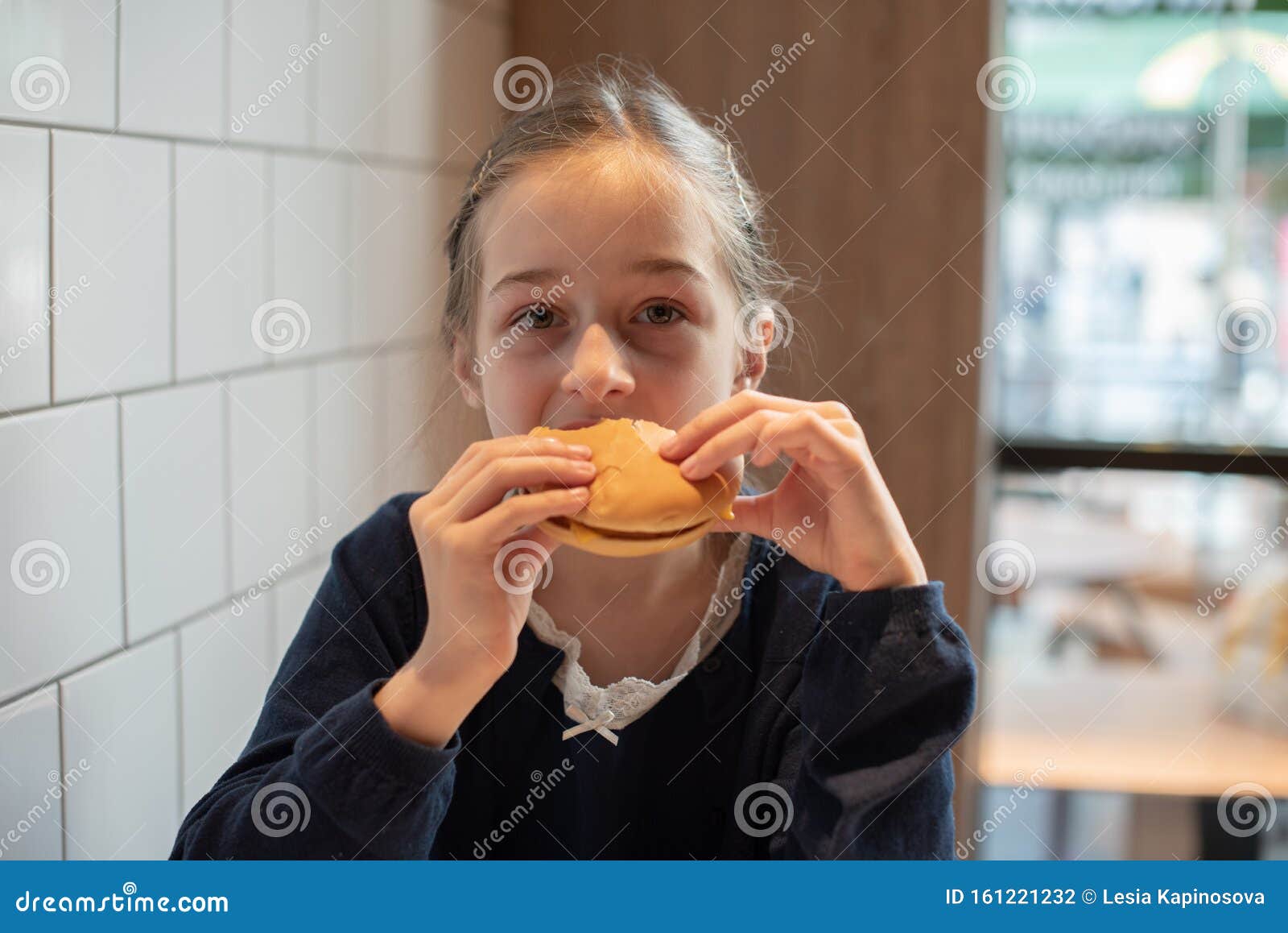 Happy Teen Girl Eating A Burger And French Fries Schoolgirl E