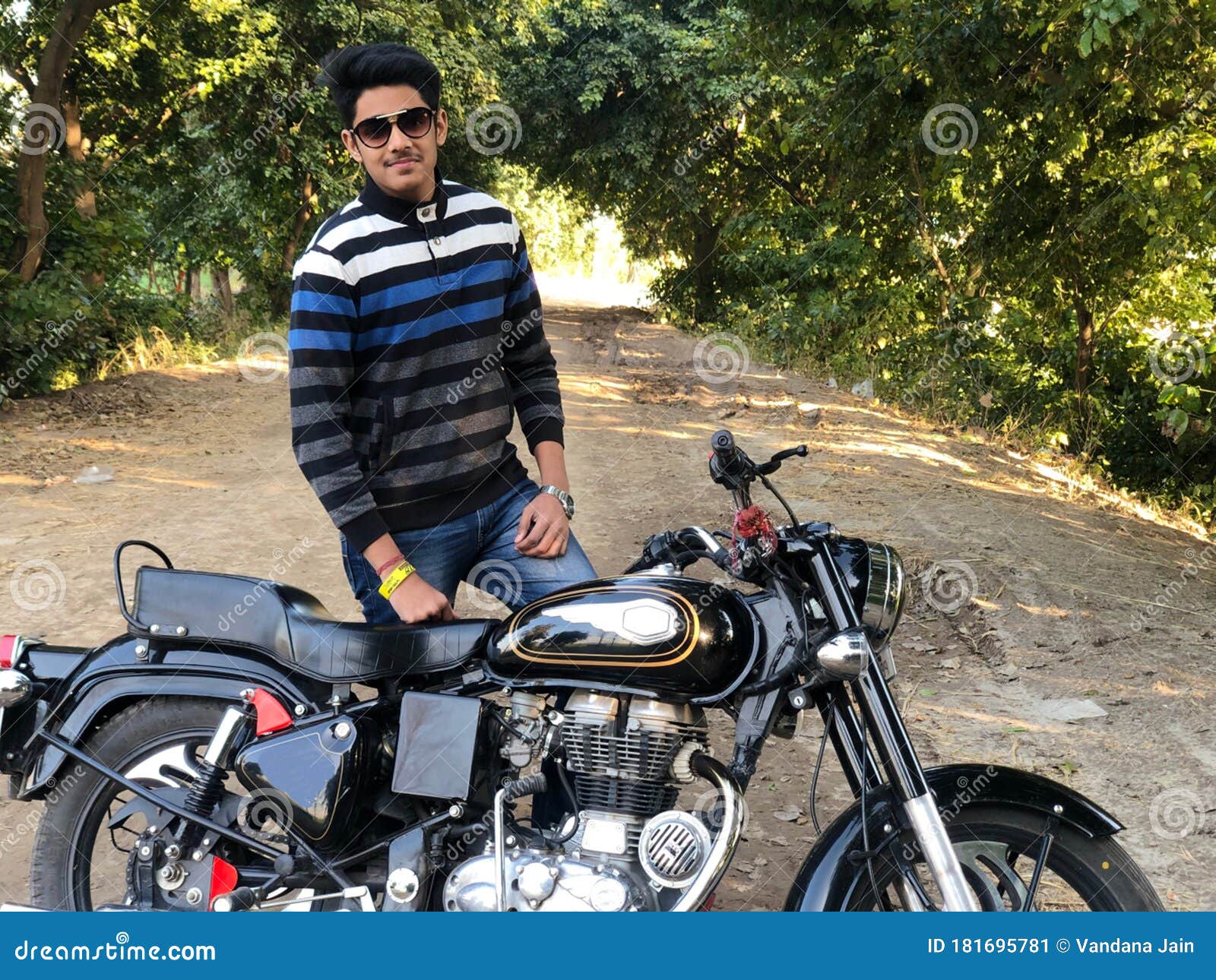 Boy posing near the bike - PixaHive