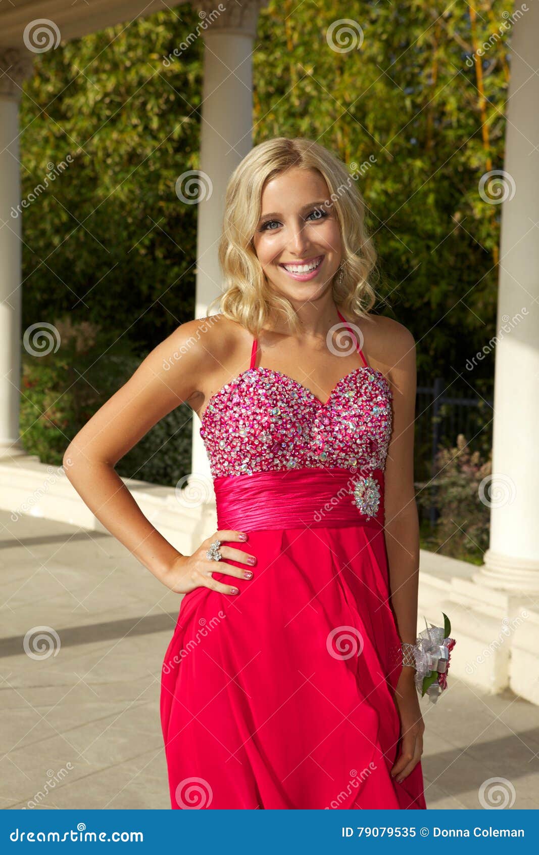 Happy Teenage Girl Going To The Prom In A Red Dress Stock