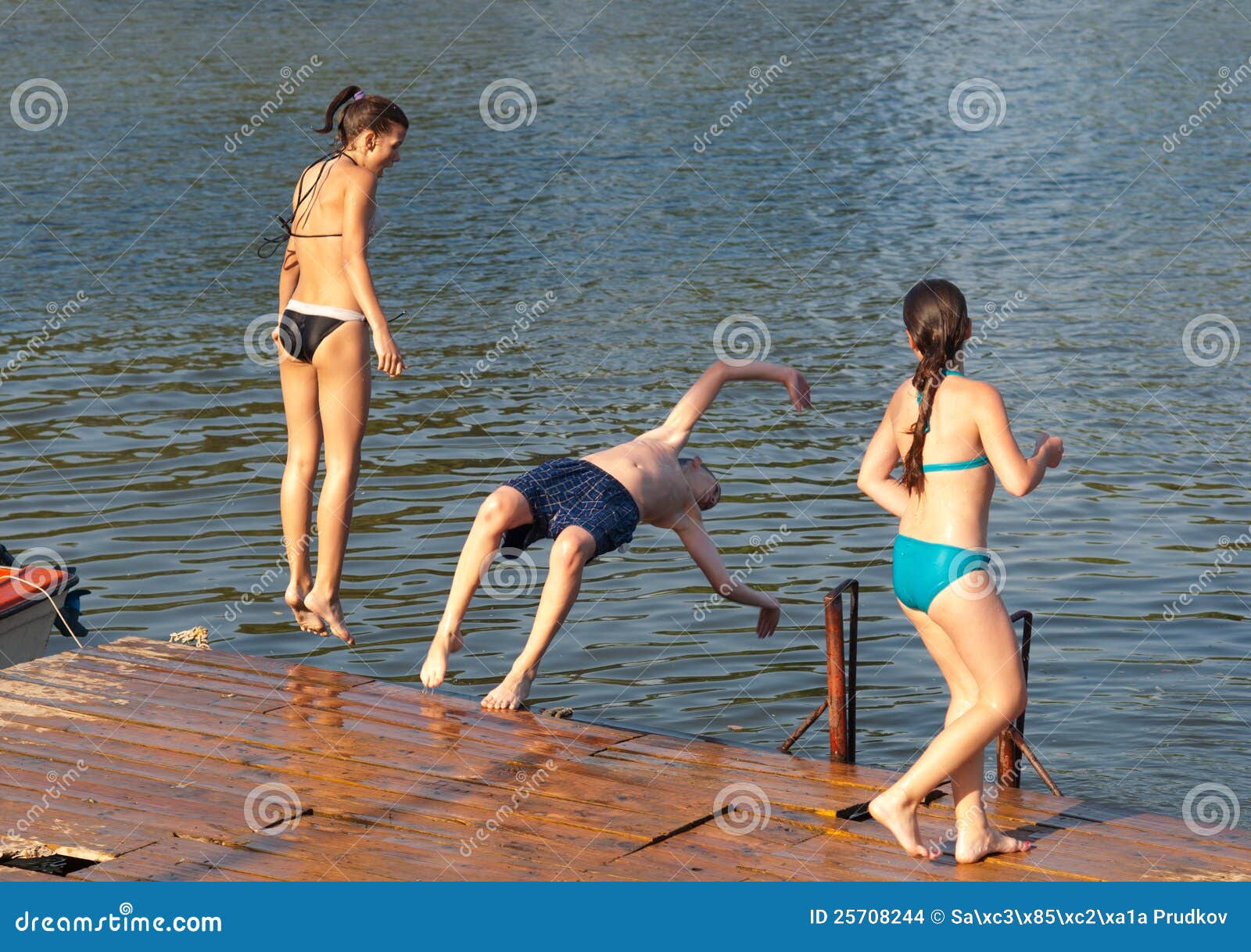 Happy Teenagers Jumping into the River Stock Photo - Image of playful,  dock: 25708244