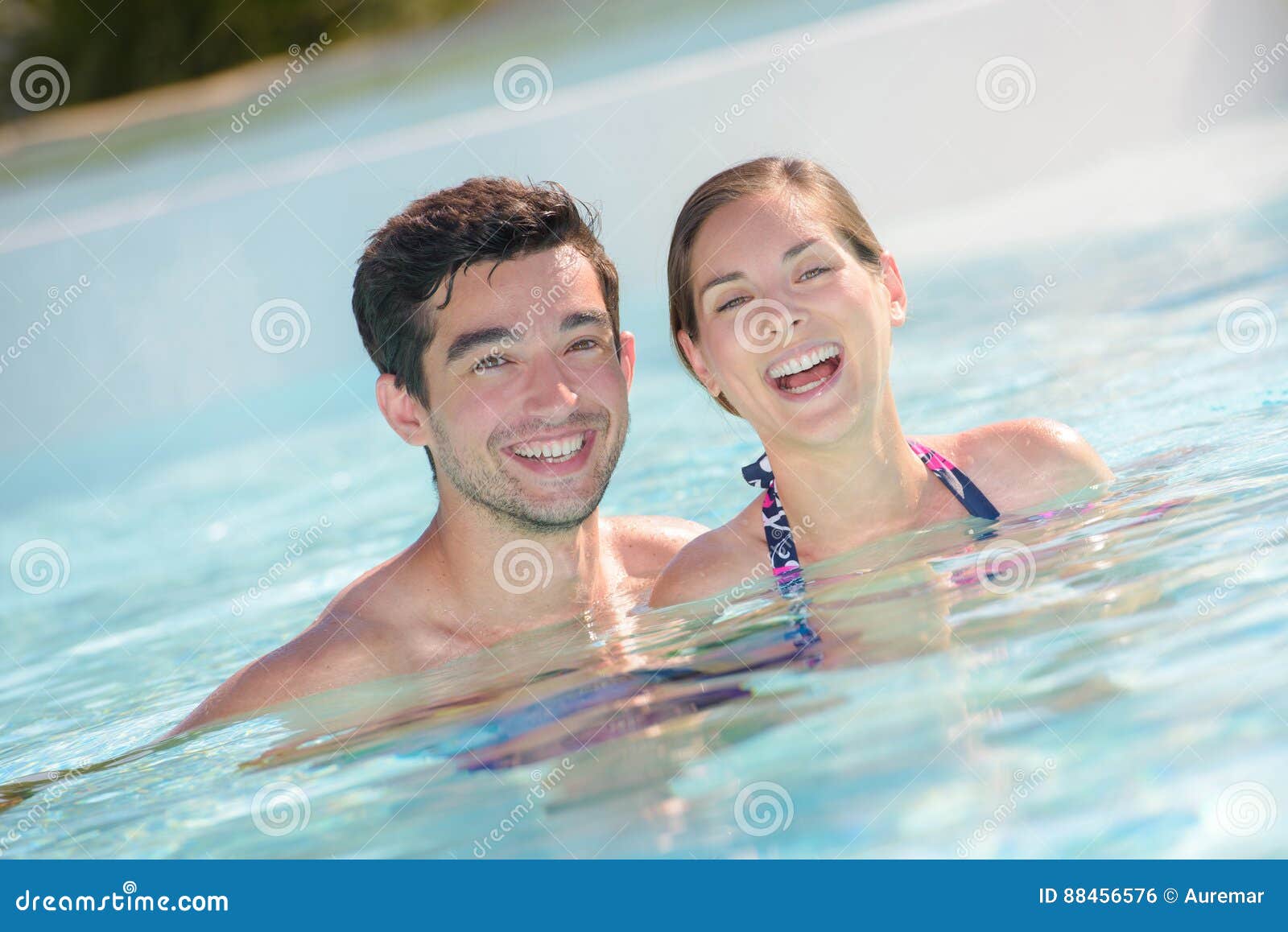 happy vacationer in swimming pool