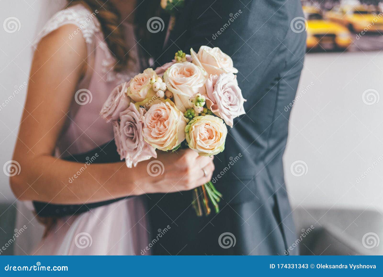 Wedding Couple Hugging and Holding Rose Bouquet Close Up Stock Image ...