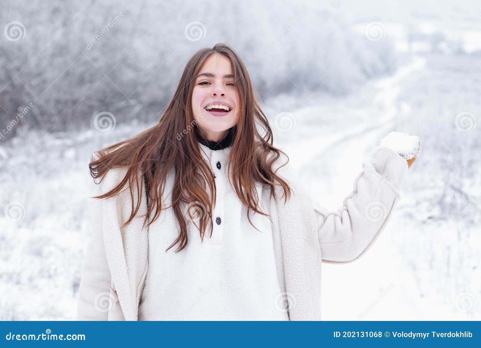 Happy Winter Woman on on Snowy Background. Outdoors. Joyful Beauty ...