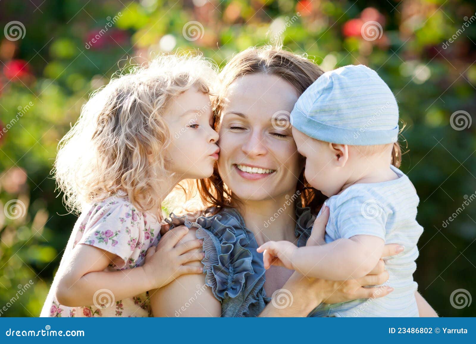 Happy Woman with Child and Baby Stock Photo Image of blurred, park
