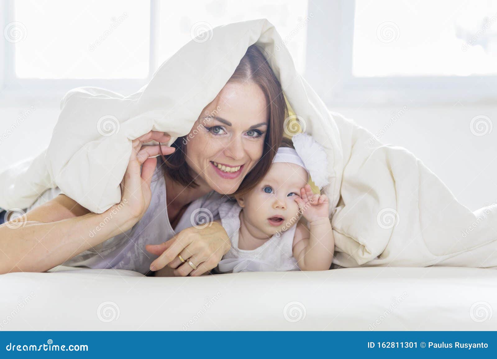 Happy Woman and Her Baby Under a Blanket Stock Image - Image of eyes ...
