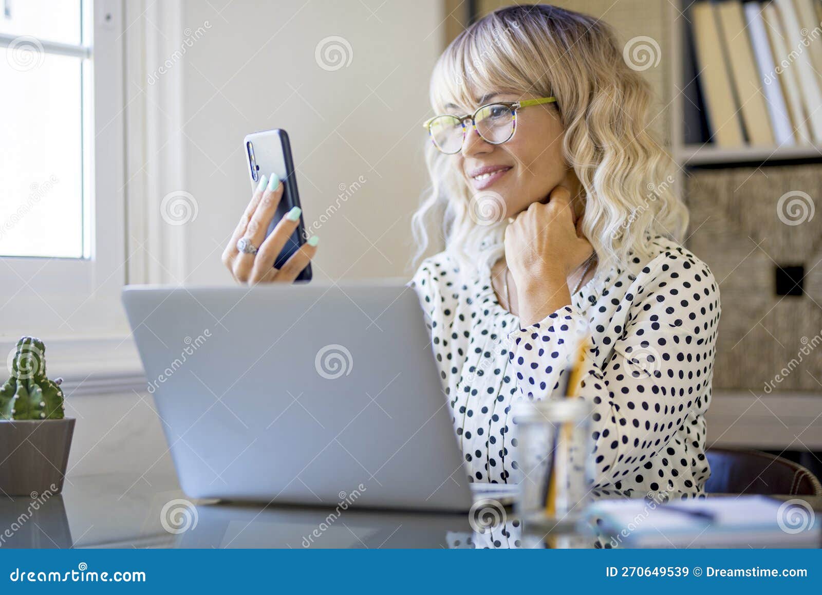 Happy Woman at Home Doing Phone Call Smiling in Smart Working Indoor