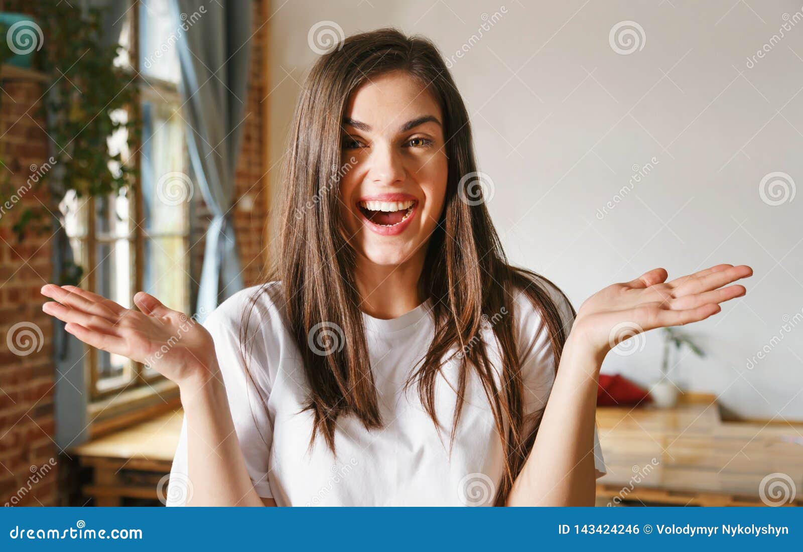 Happy Woman Laughing Stock Photo Image Of Tshirt Brunette 143424246