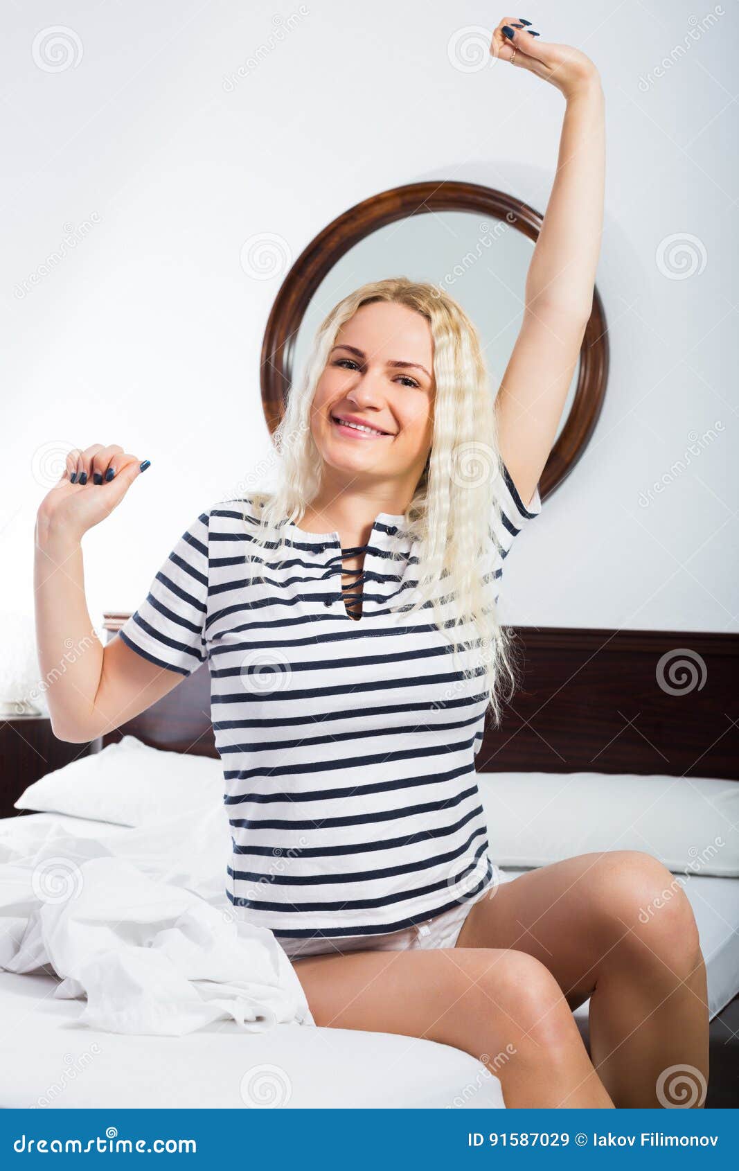 happy woman with long hair awaking