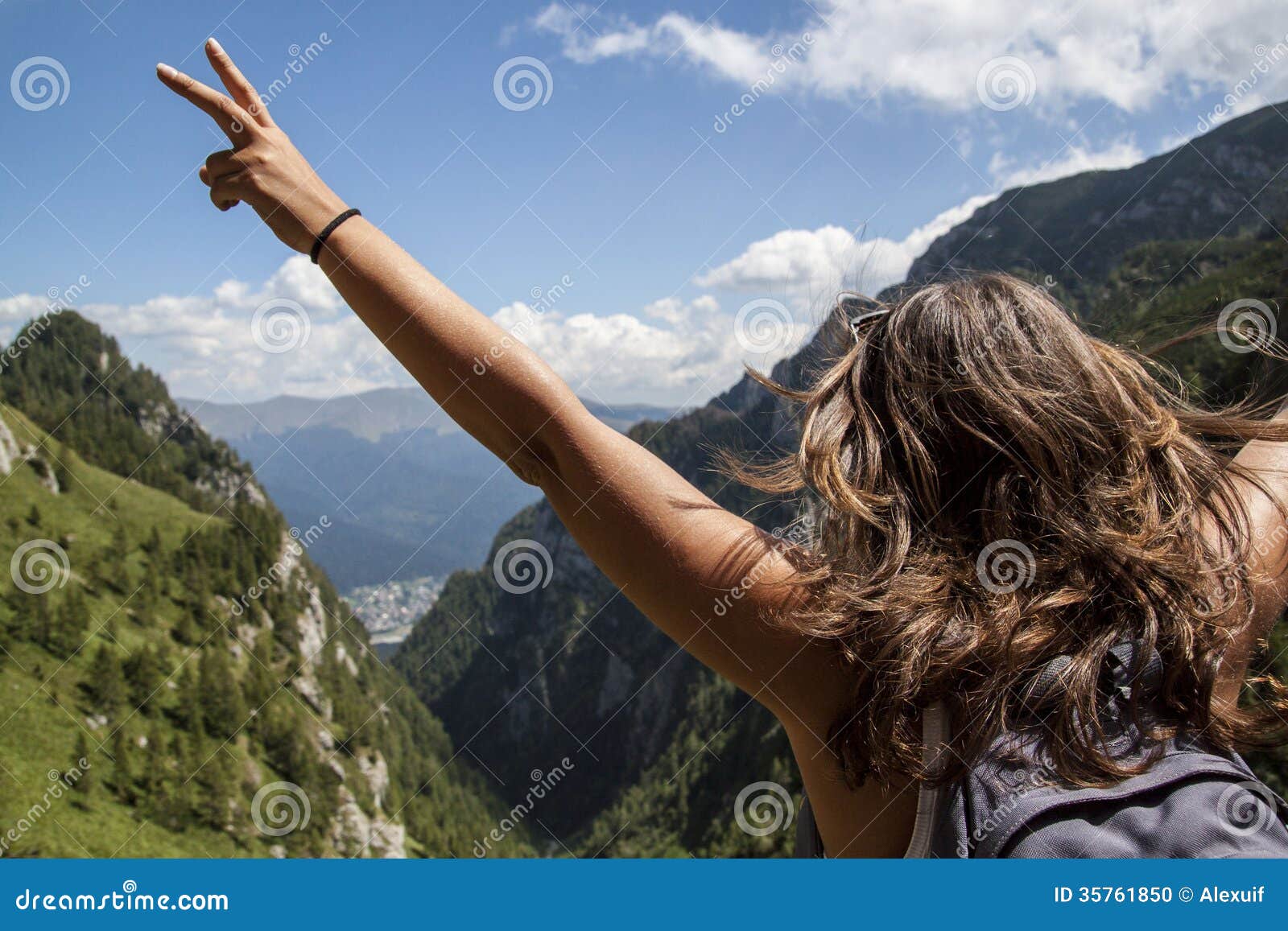 happy woman on mountain hike