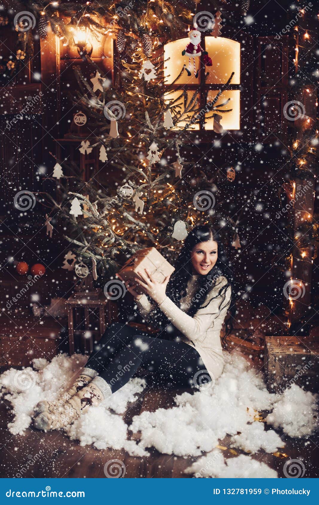 Happy Woman with Present Under Christmas Tree. Stock Image - Image of ...