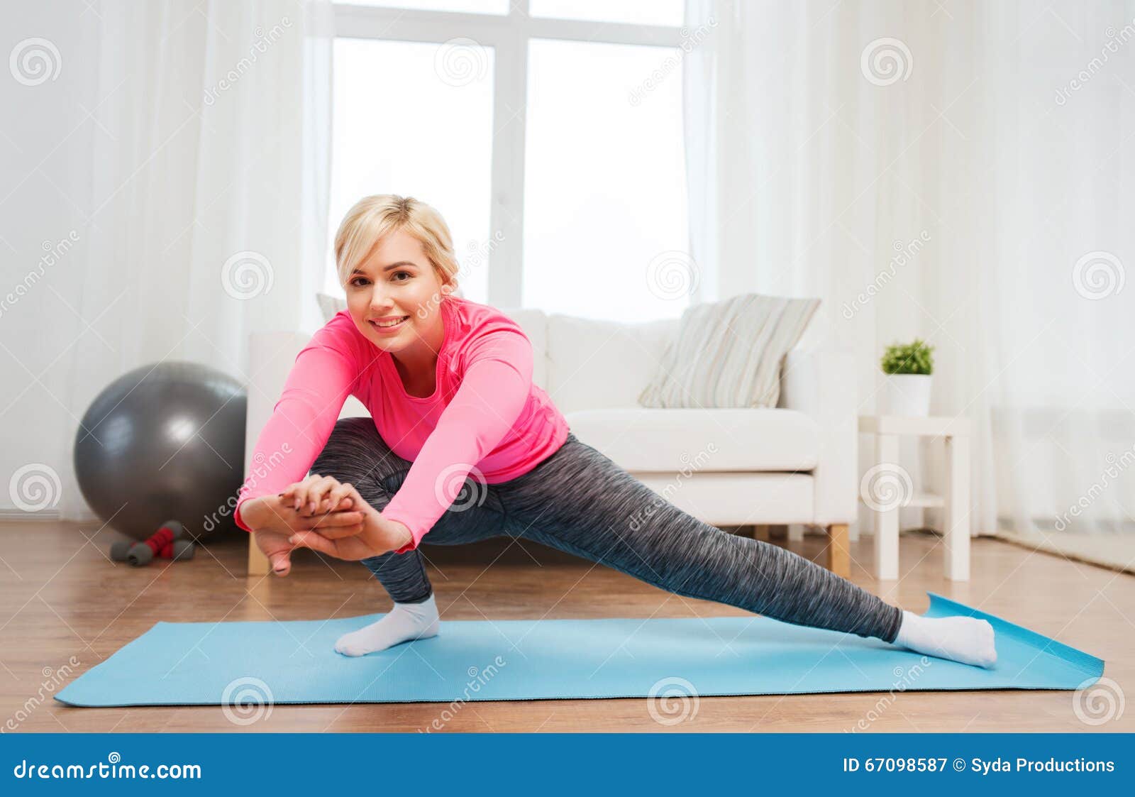 Happy Woman Stretching Leg On Mat At Home Stock Image Image Of