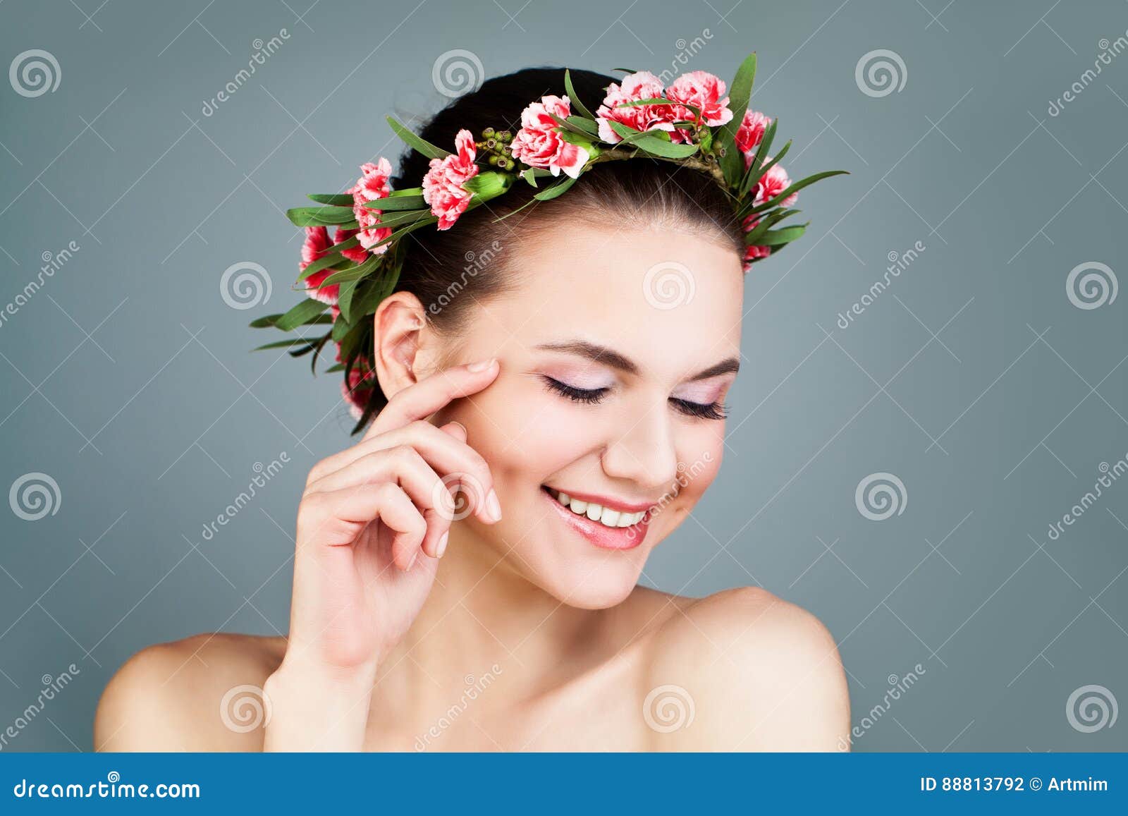 happy woman wearing flowers wreath