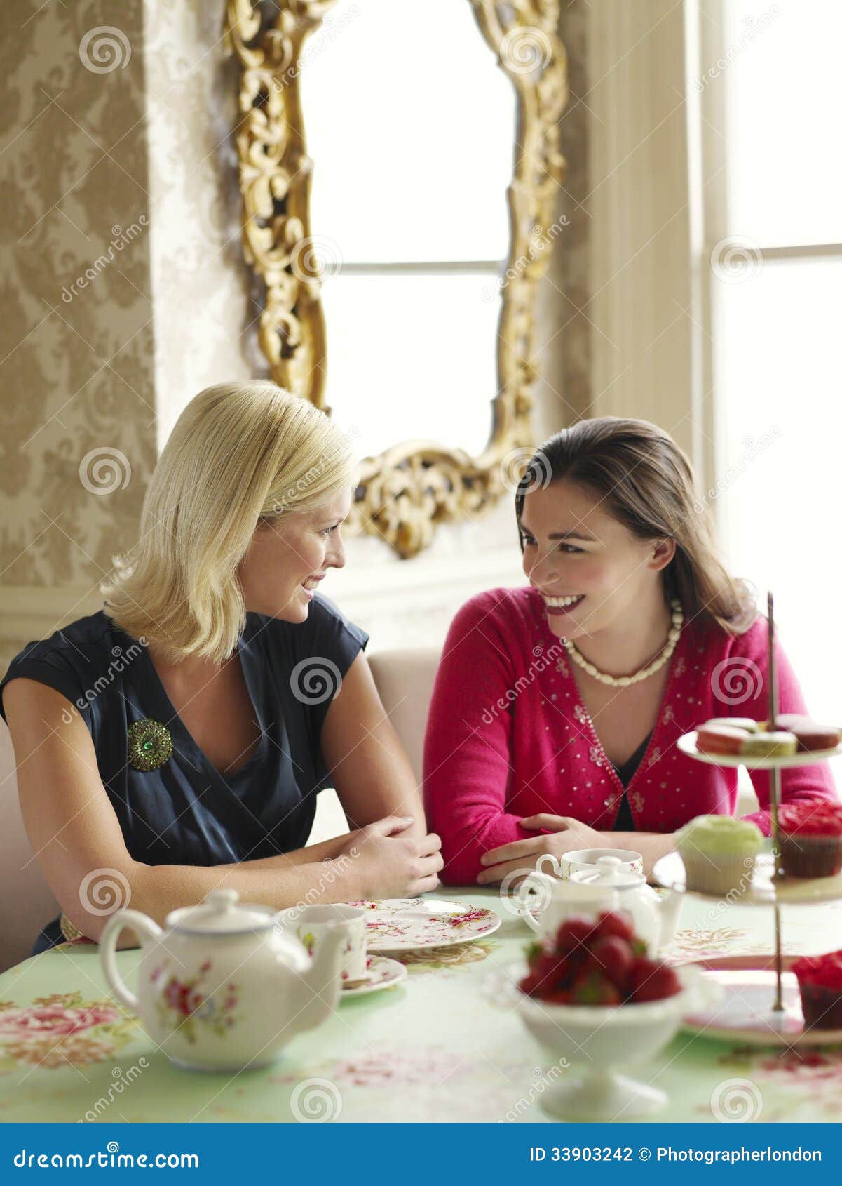 happy women at dining table