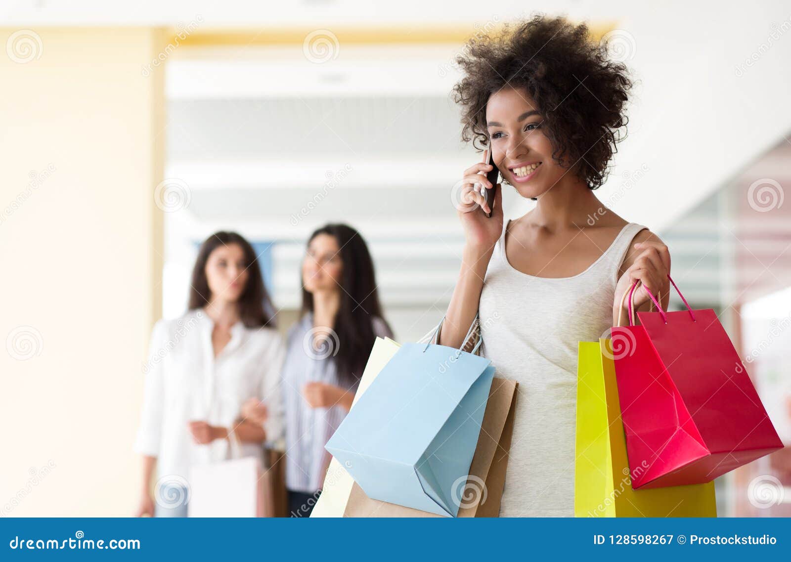 Happy Woman Talking on Mobile Phone while Shopping Stock Image - Image ...