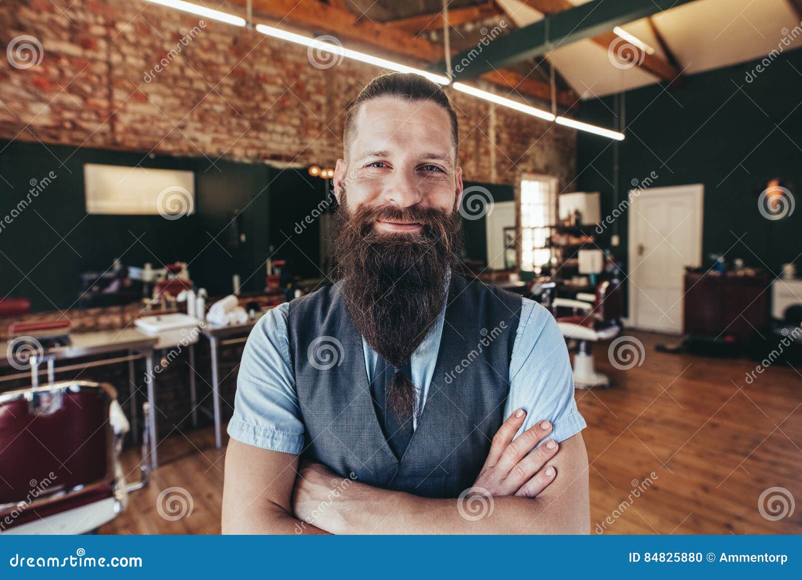 Happy Young Barber Smiling at His Barbershop Stock Photo - Image of ...