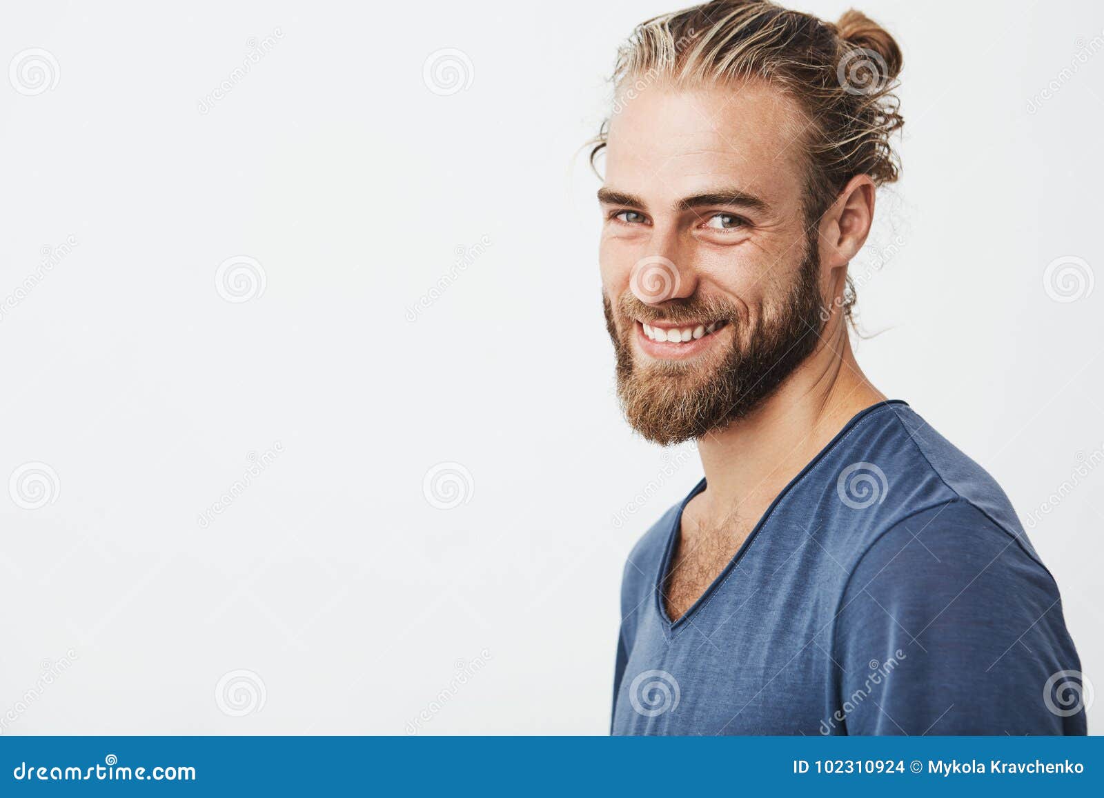 Happy Young Bearded Guy with Fashionable Hairstyle and Beard Looking at ...