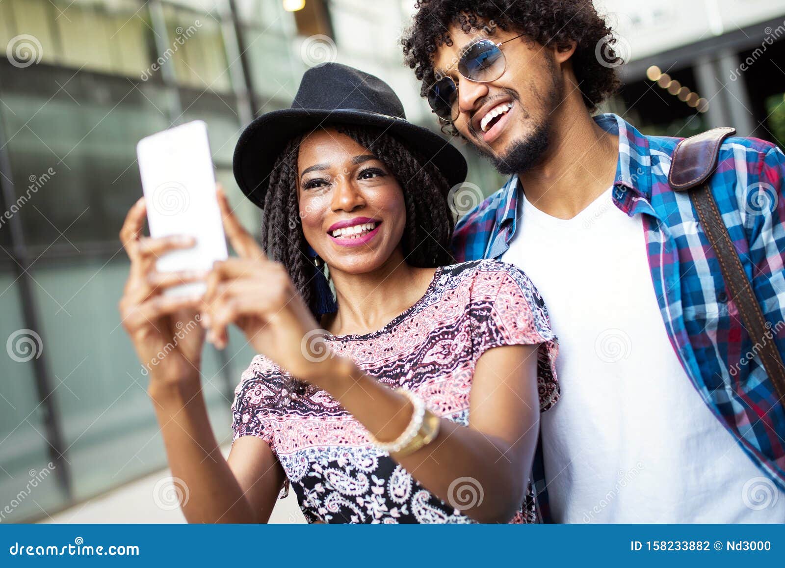 Happy Young Black Couple Hugging and Laughing Outdoors. Stock Photo ...