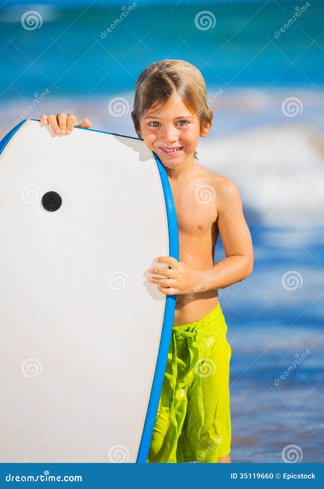 Happy Young Boy Having Fun at the Beach on Vacation, Stock Photo ...