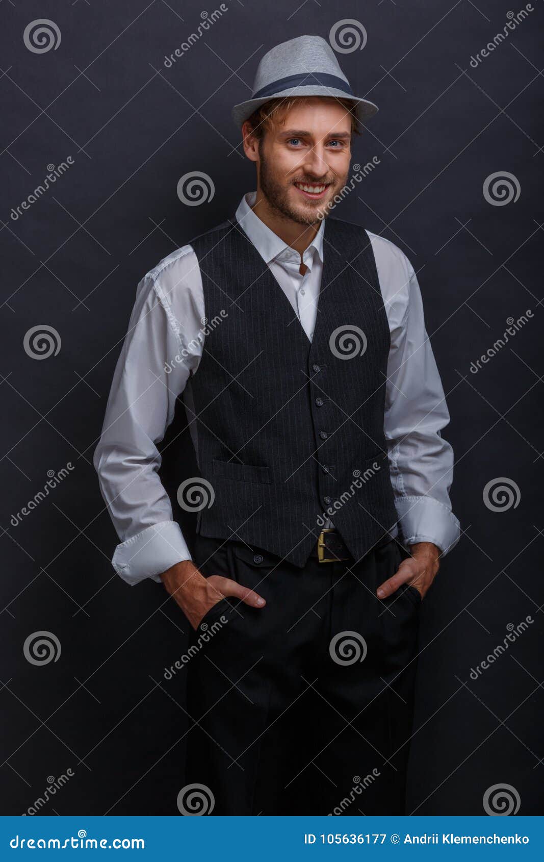 A Happy Guy, in a Retro Suit and a Hat, Holding His Hands in His ...