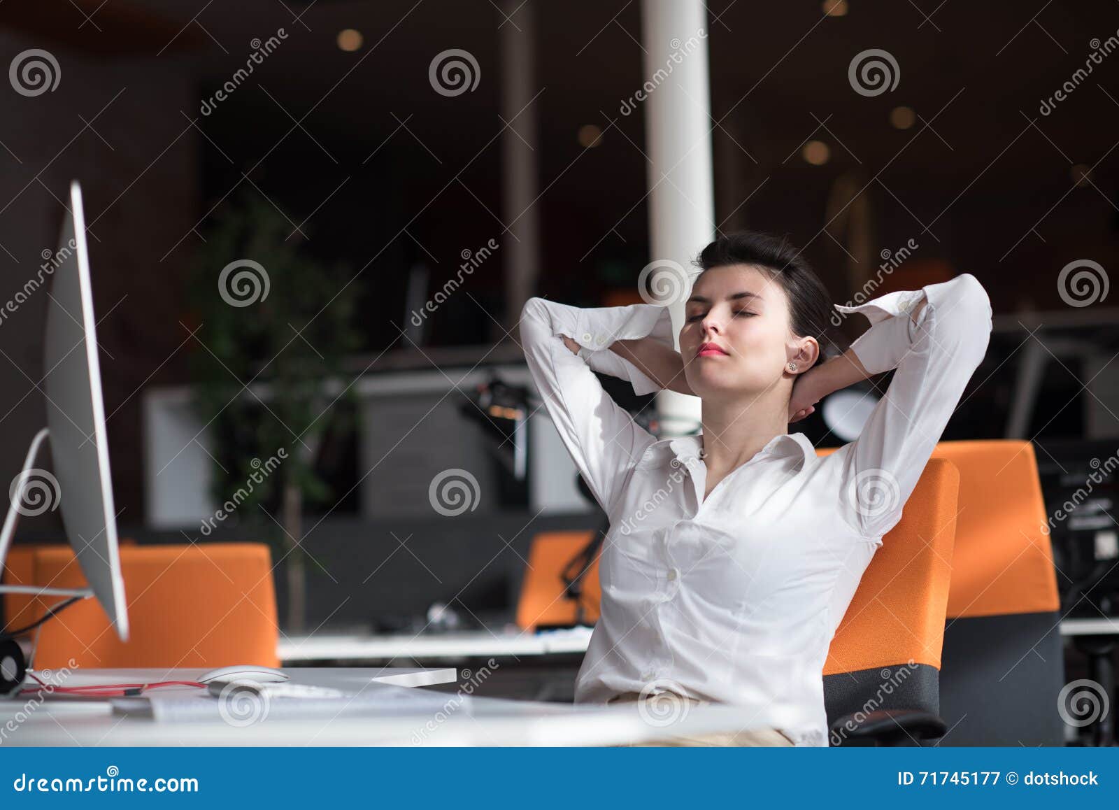 happy young business woman relaxing and geting insiration