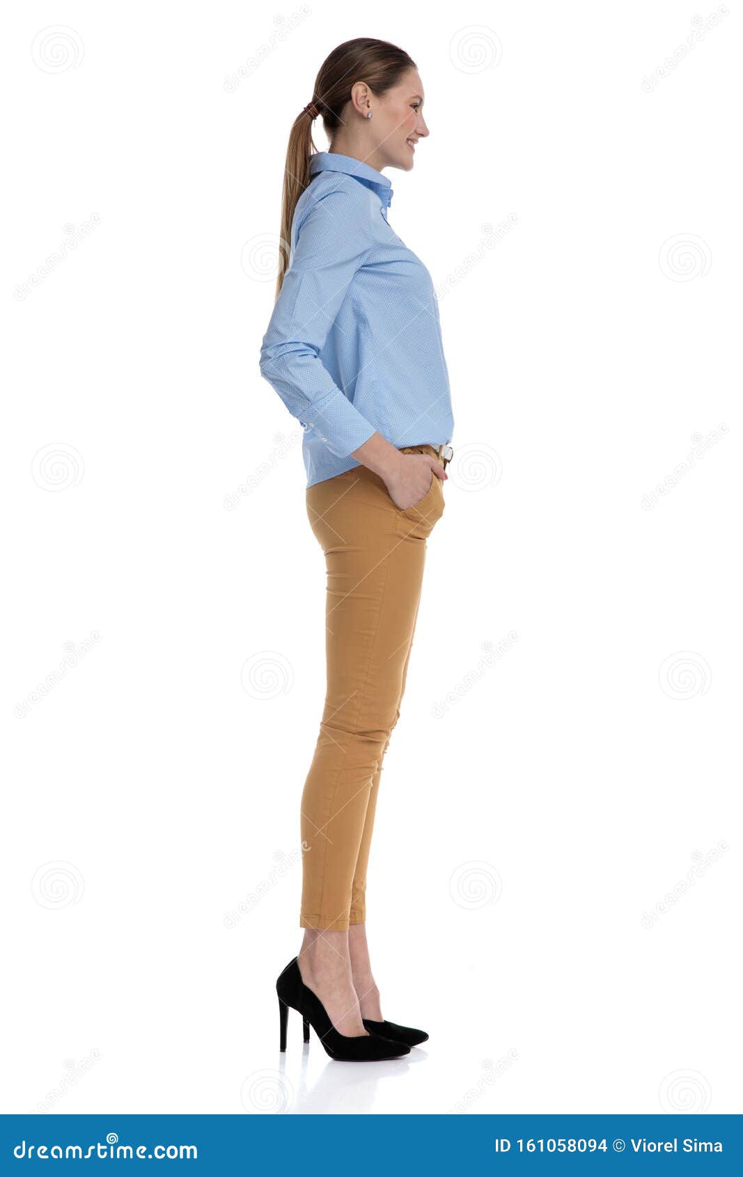 Happy Young Businesswoman Wearing Blue Shirt and Smiling Stock Photo ...