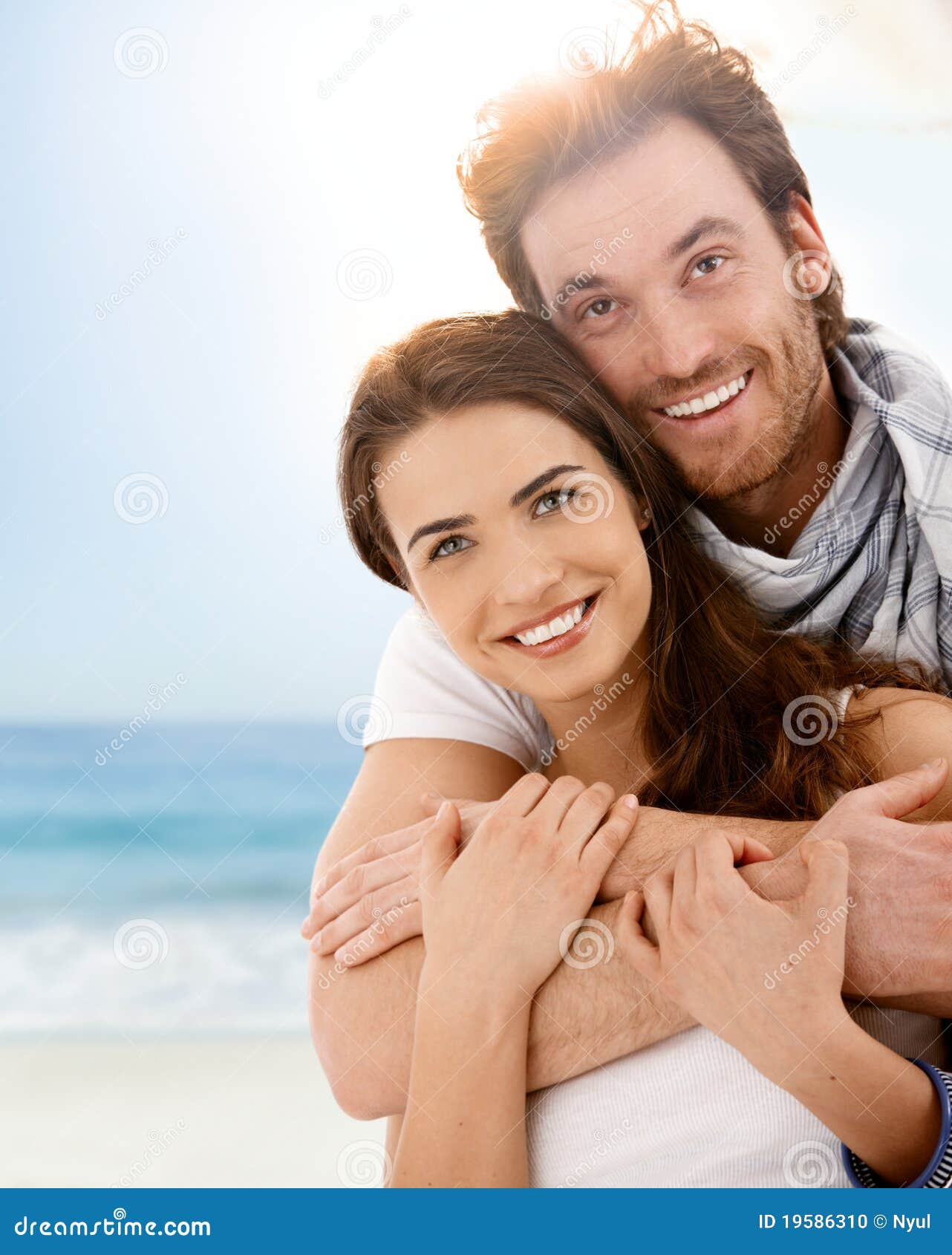 Happy Young Couple Embracing on Summer Beach Stock Photo - Image of