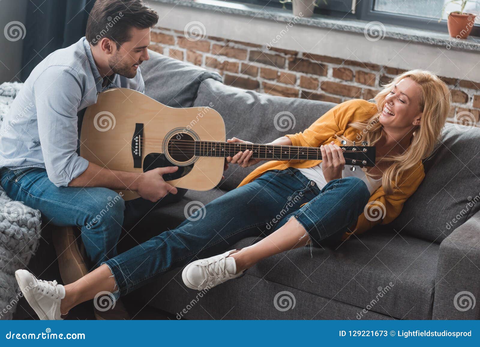 Happy Young Couple Having Fun While Fighting Stock Image Imag