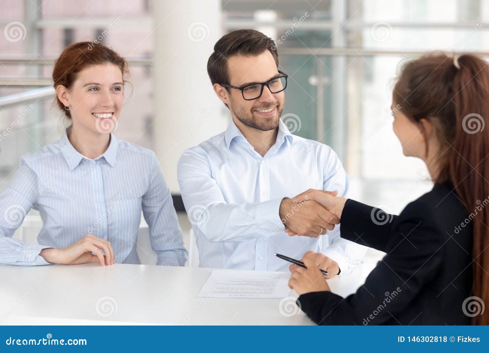 Happy Young Couple Signing Mortgage Insurance Investment Contract Handshake Broker Stock Photo - Image of investment, loan: 146302818
