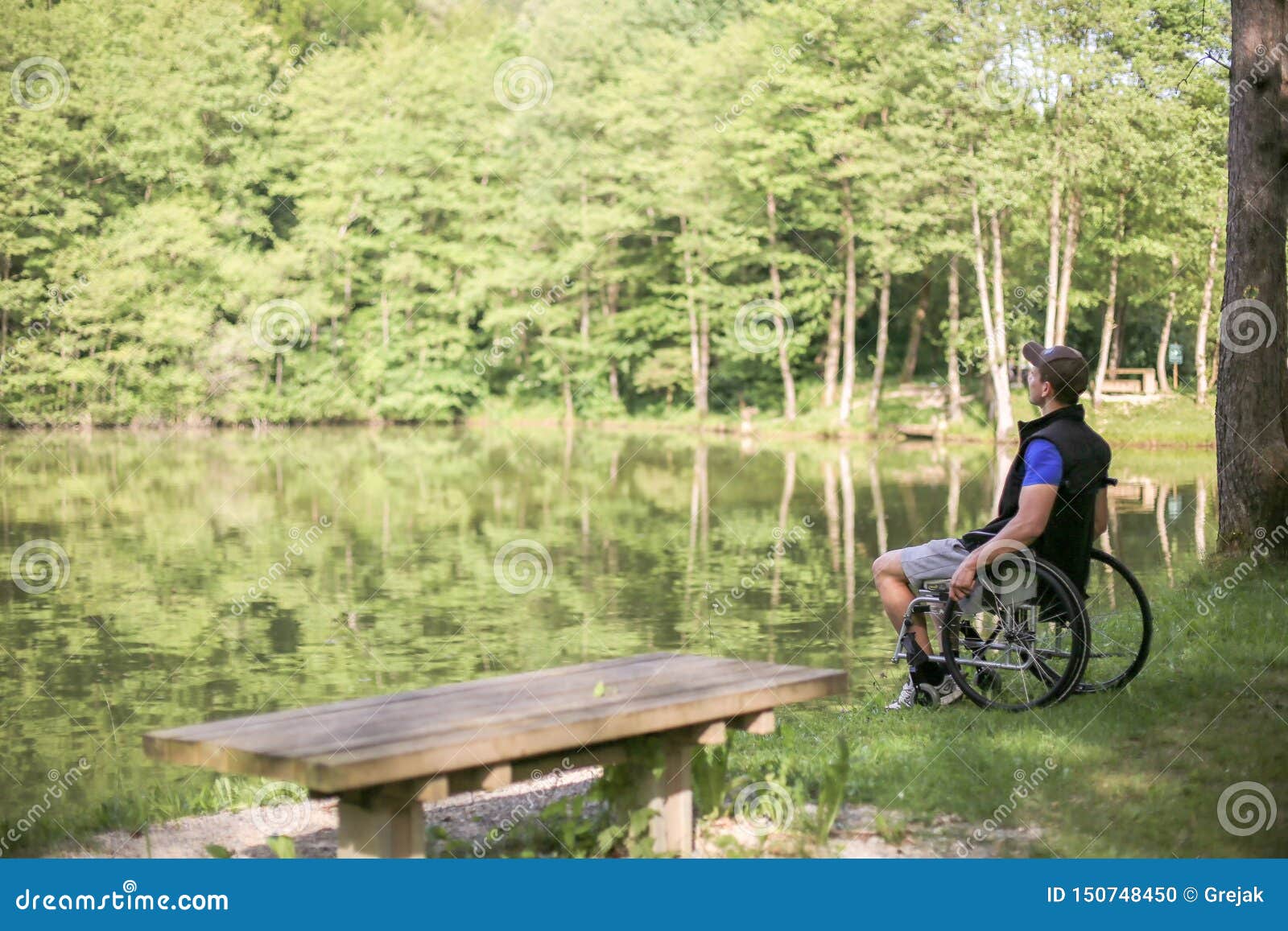 Disabled Man on Wheelchair in Stock Photo - Image of help: