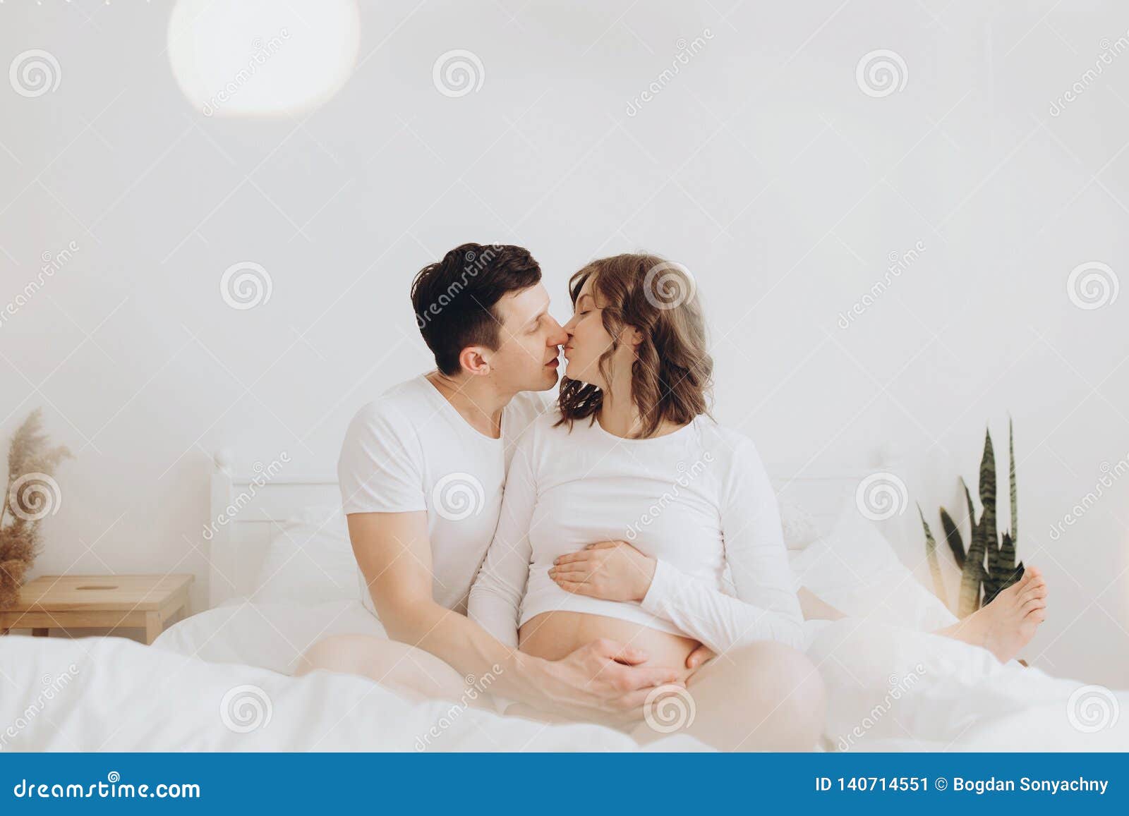 705 Husband Kissing Pregnant Belly His Wife Stock Photos