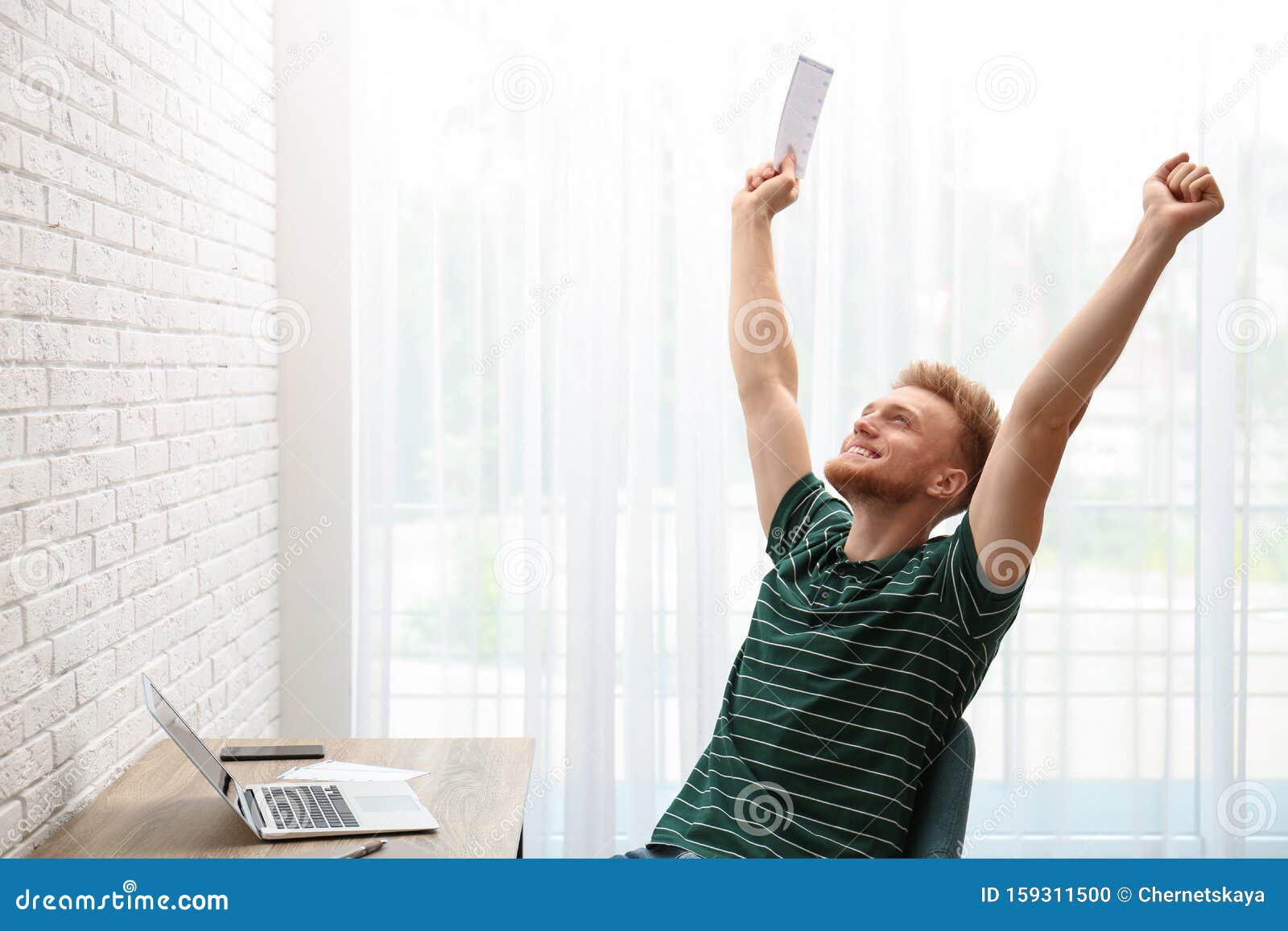 Happy Young Lottery Winner with Ticket Stock Photo Image of award