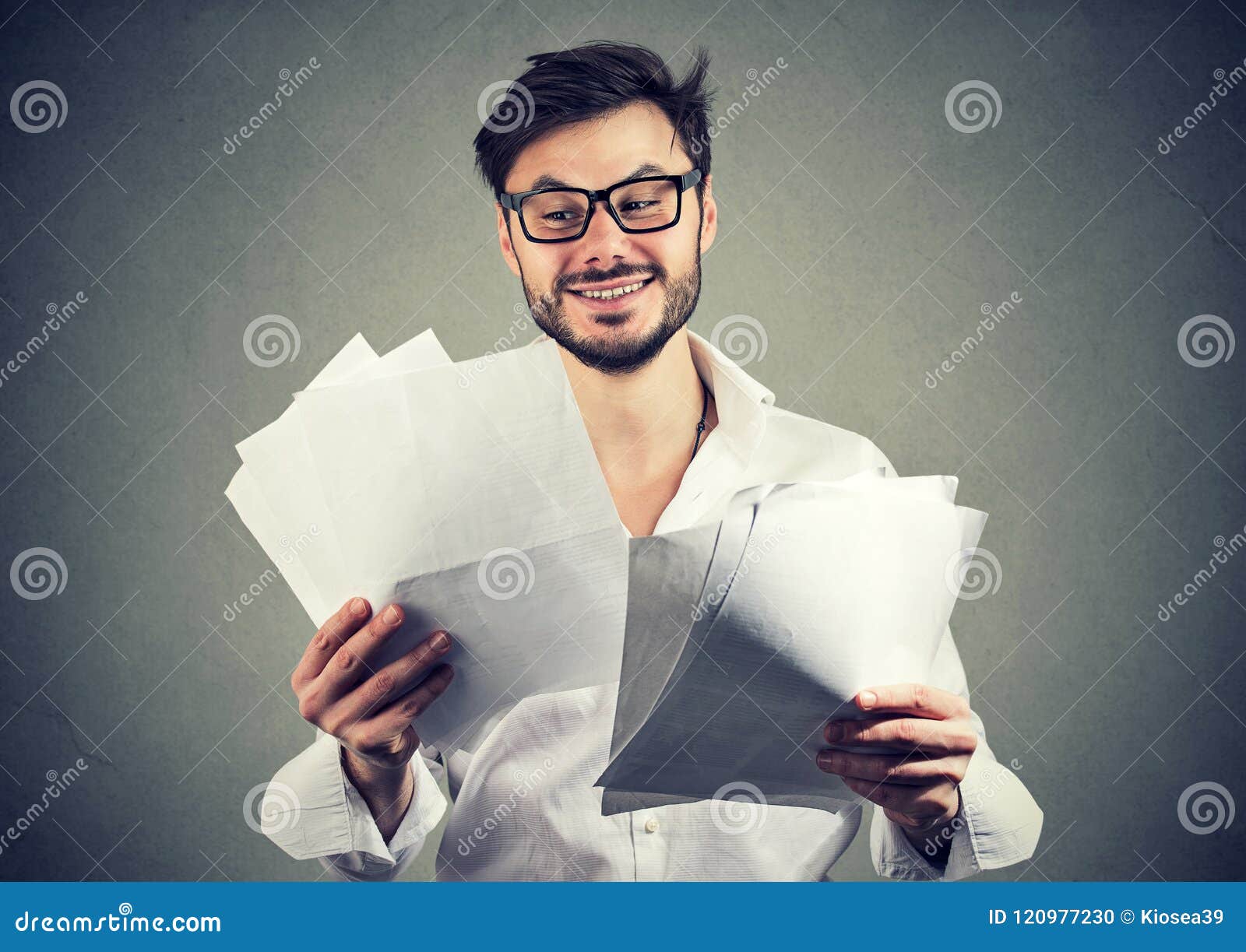 cheerful beard man reading papers
