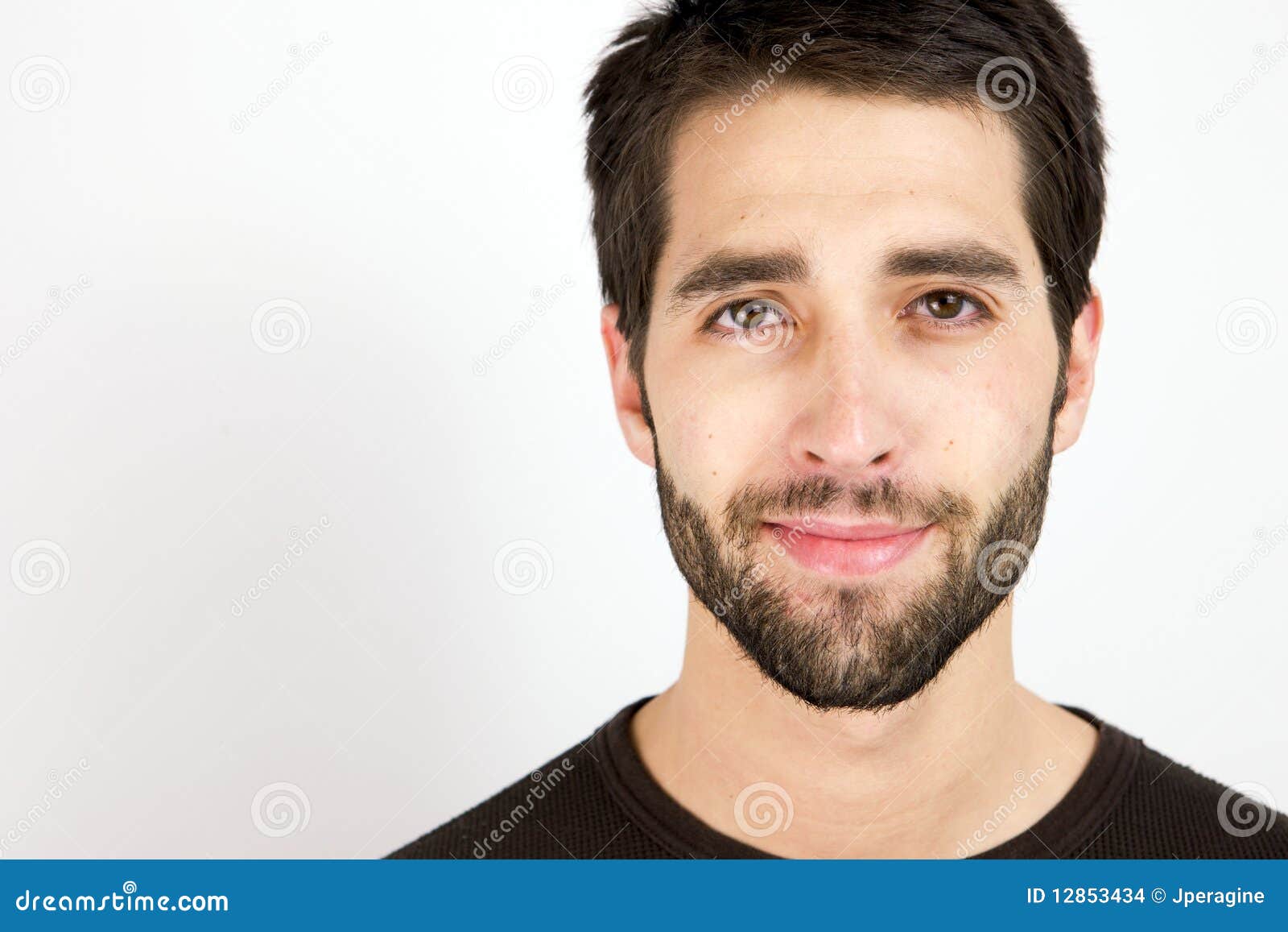 happy-young-man-looking-camera-12853434.jpg