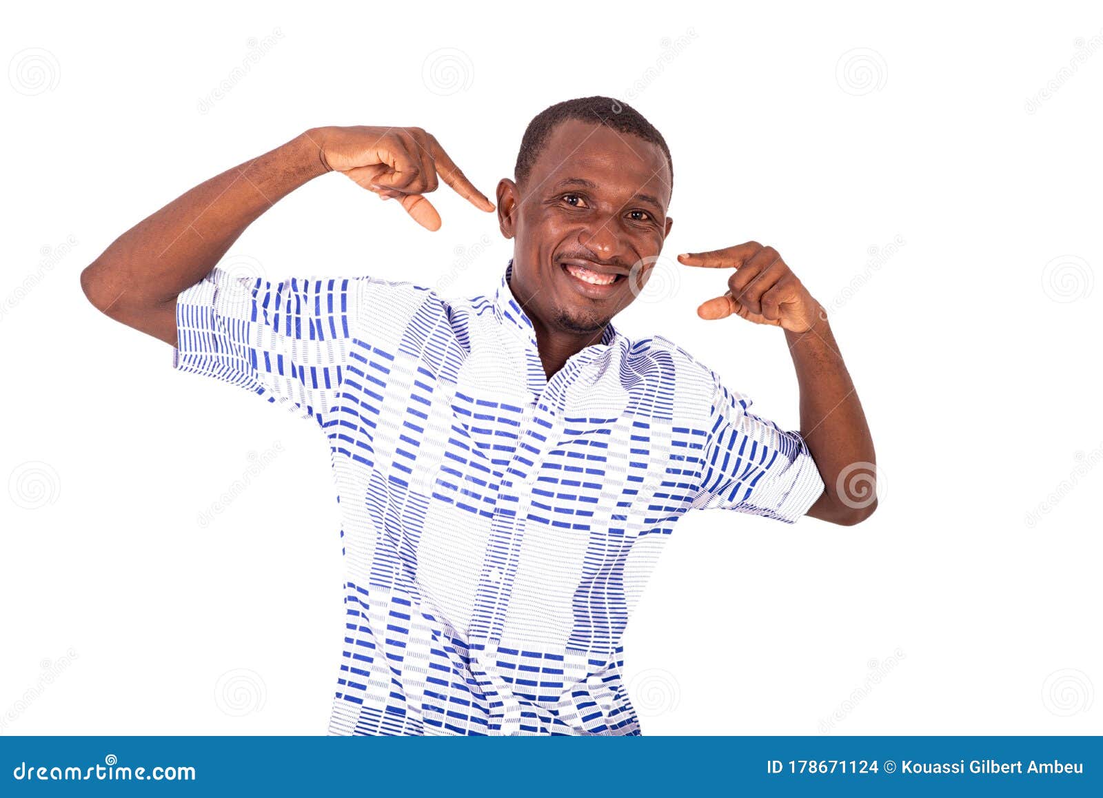 Young Man Pointing Fingers on His Face Stock Photo - Image of smile ...