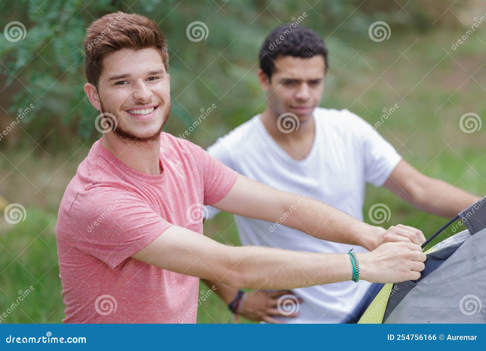 Happy young men camping stock photo. Image of traveler 254756166