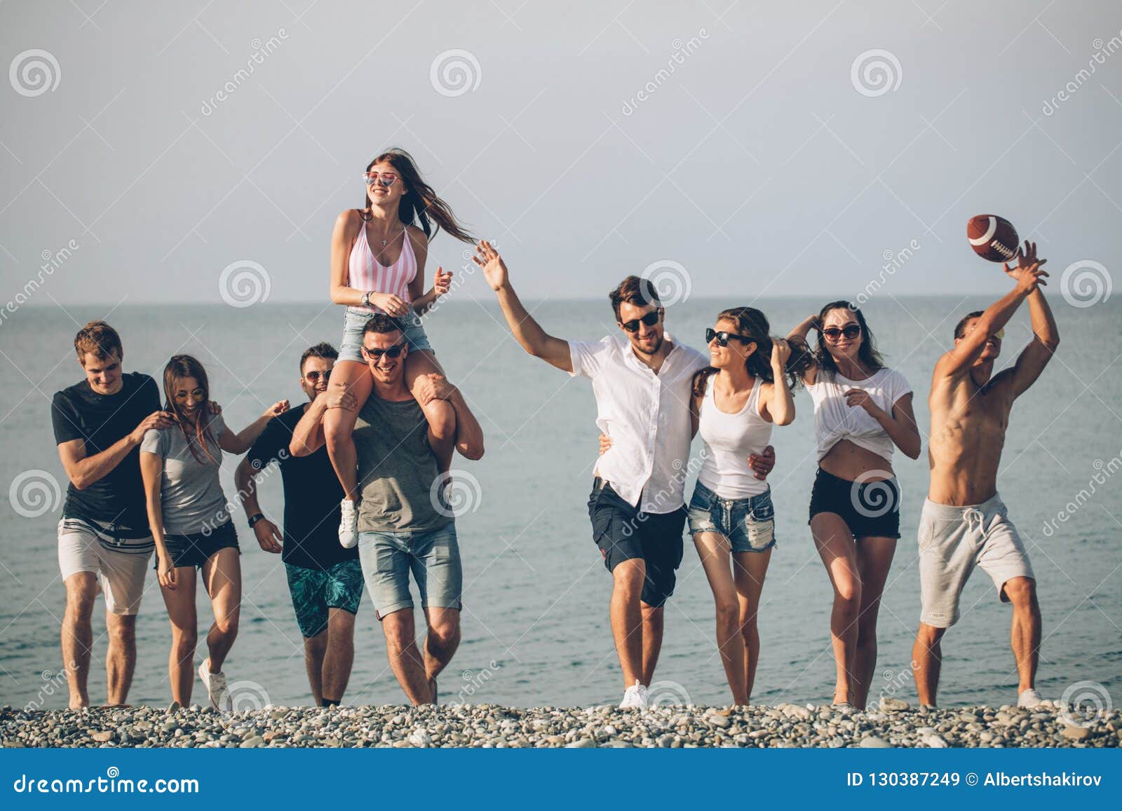 Group of Friends Walking at Beach, Having Fun, Womans Piggyback on Mans,  Funny Vacation Stock Image - Image of happiness, beach: 130387249