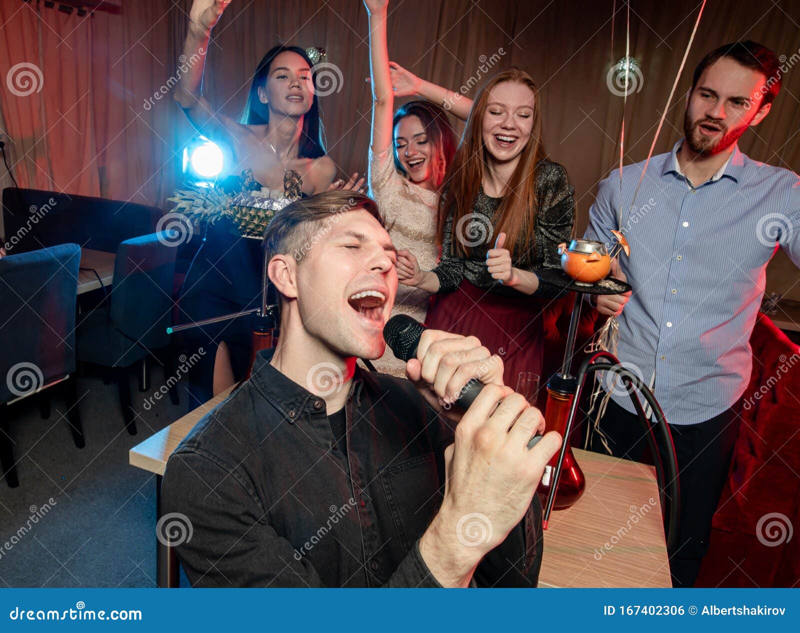 Happy Young Singers in Karaoke Bar Stock Photo - Image of nightclub,  friendship: 167402306
