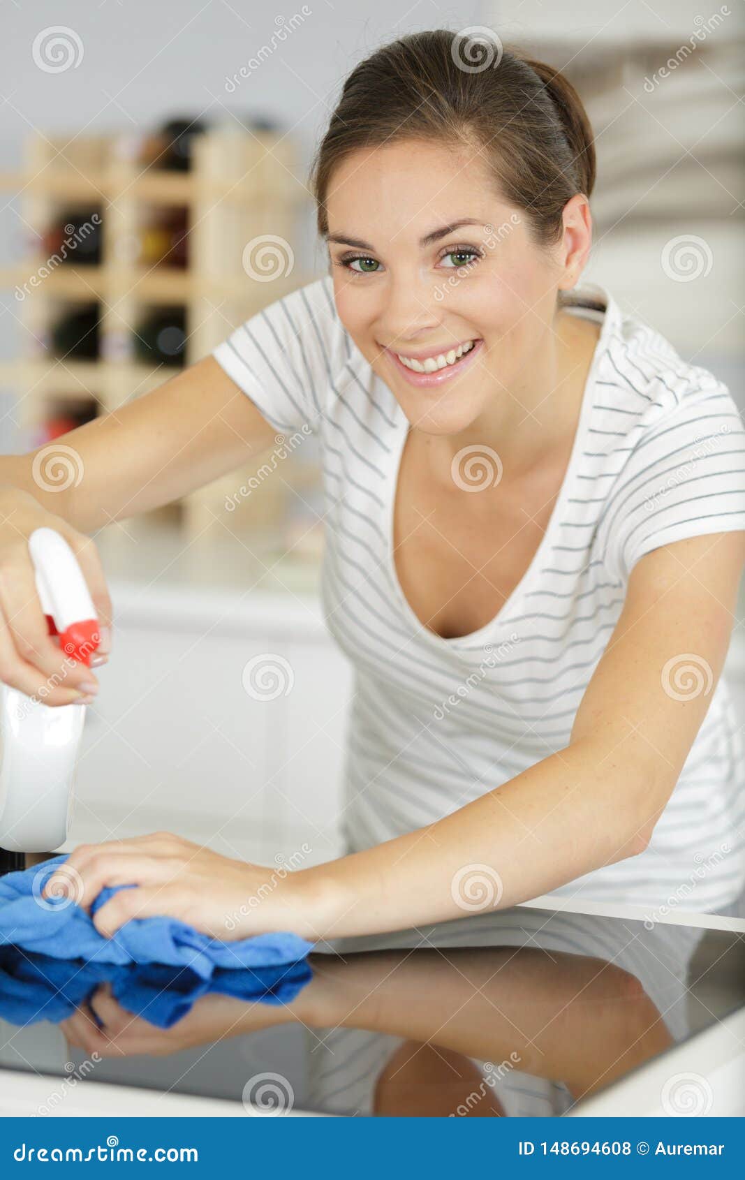 Happy Young Woman Cleaning Kitchen with Spray Stock Photo Image of