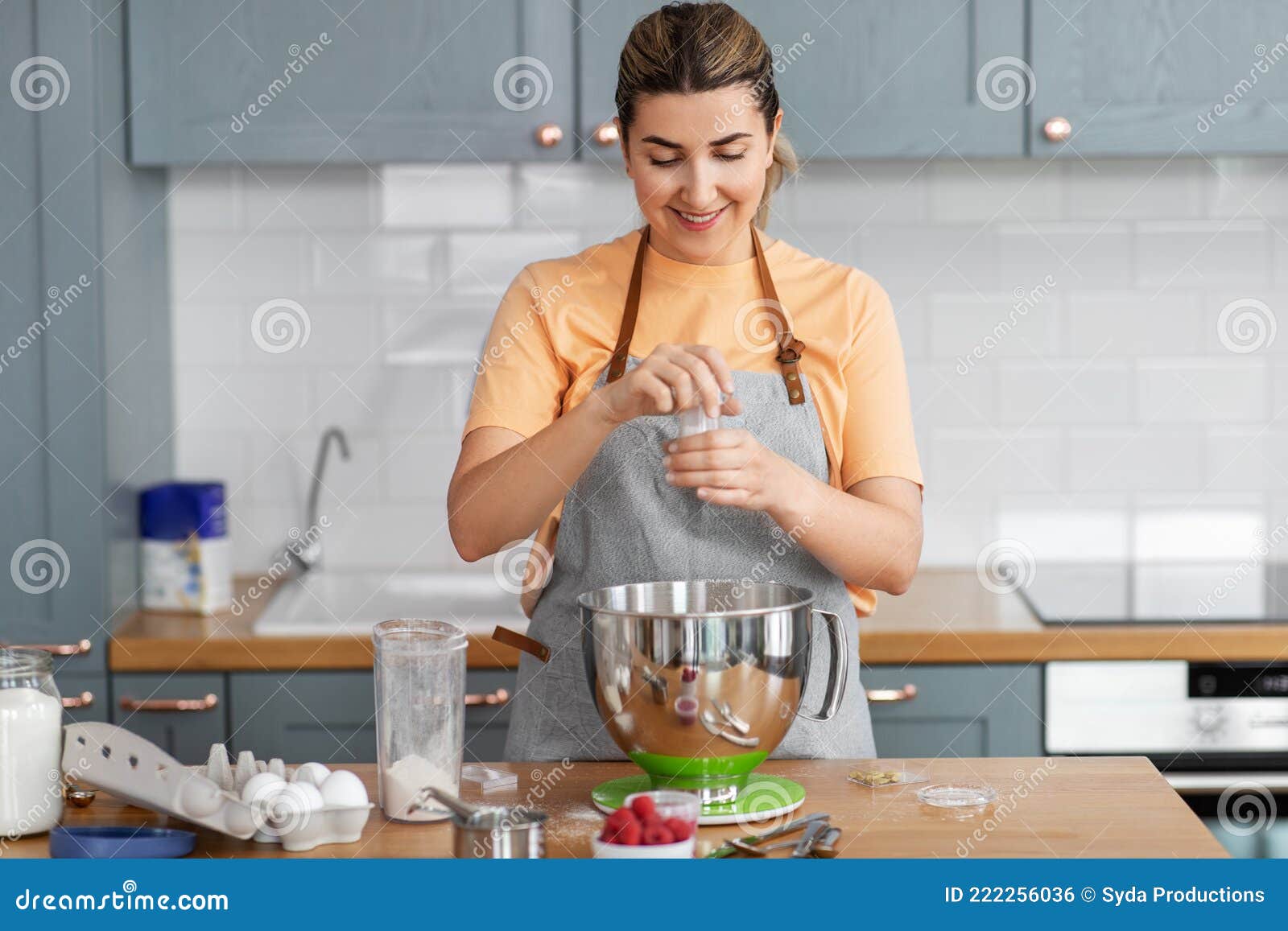 Happy Young Woman Cooking Food on Kitchen at Home Stock Photo - Image ...