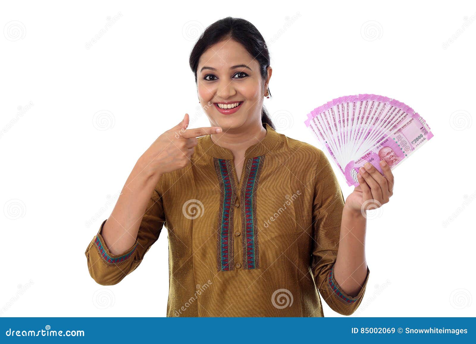 happy young woman holding indian 2000 rupee notes