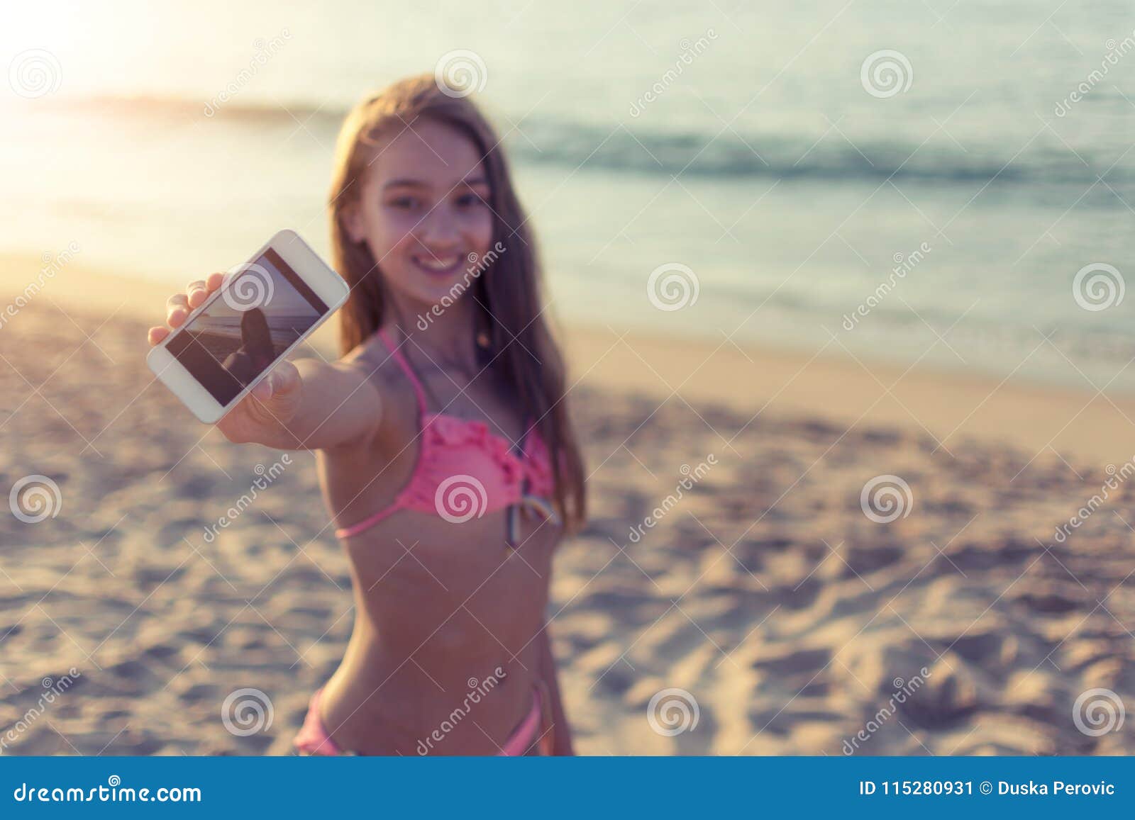 women with dildo selfie