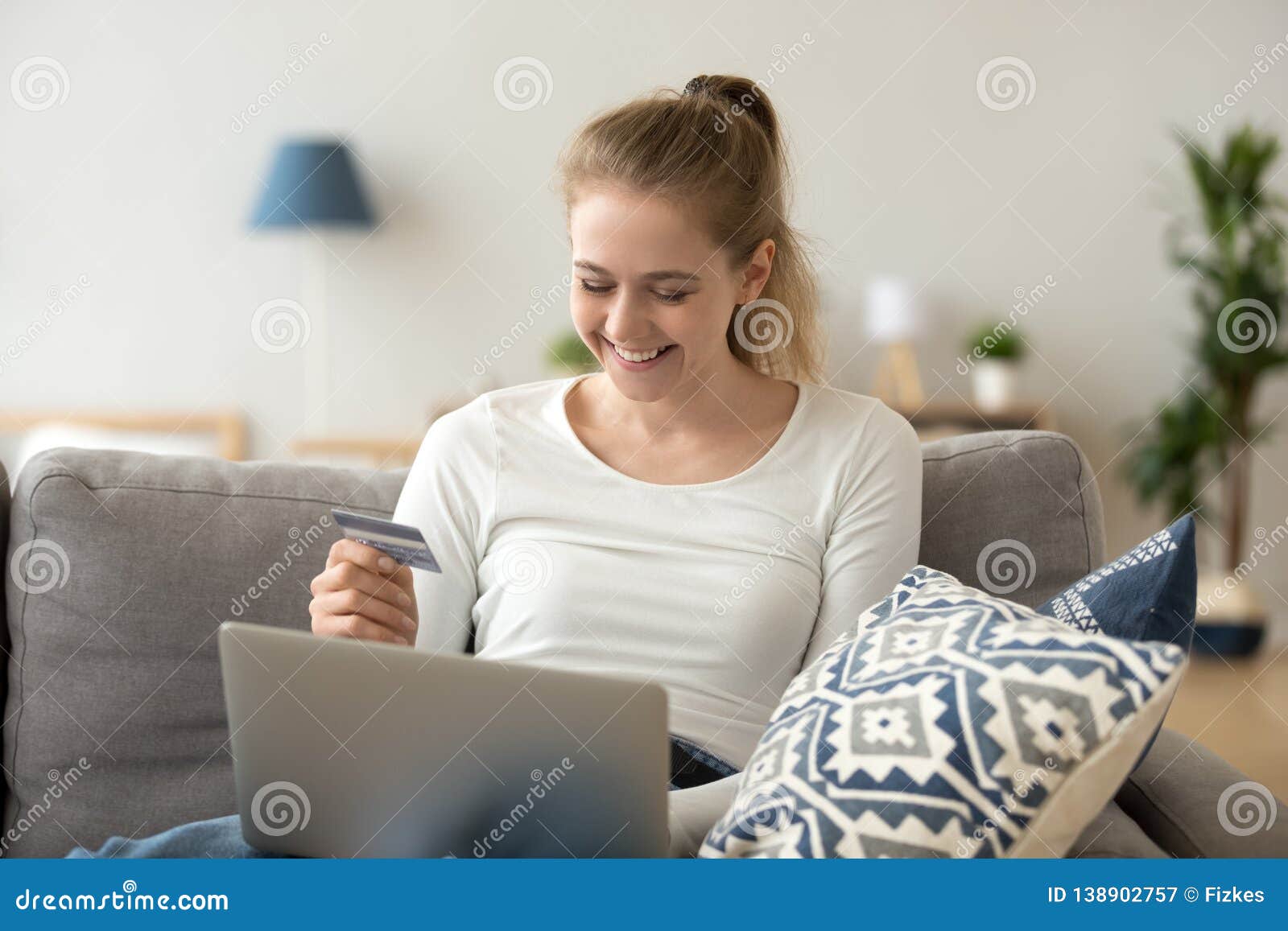 Happy Young Woman Using Laptop Buying Online with Credit Card Stock ...