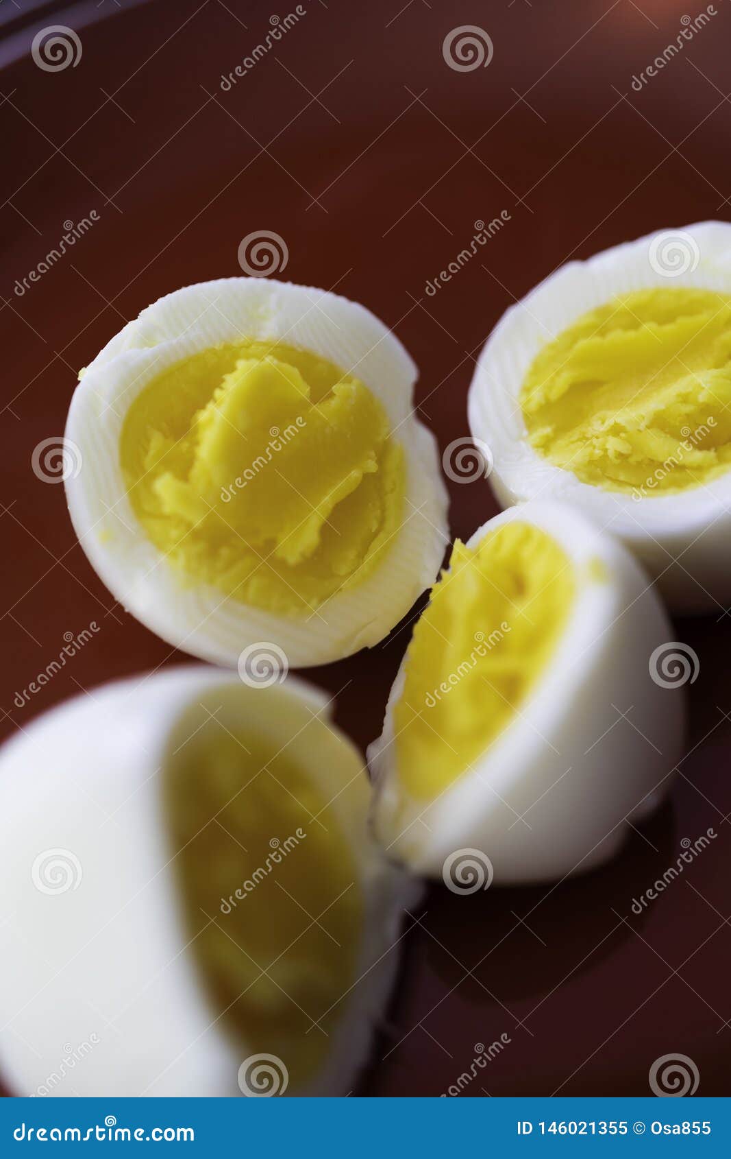 Hard Boiled Eggs Sliced in 2 with Pepper and Salt Stock Image Image