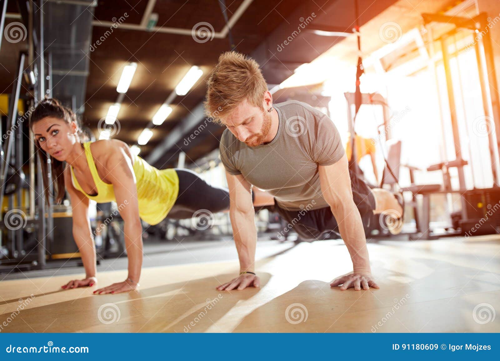 Hard exercise in gym stock image. Image of exercise, hand 91180609