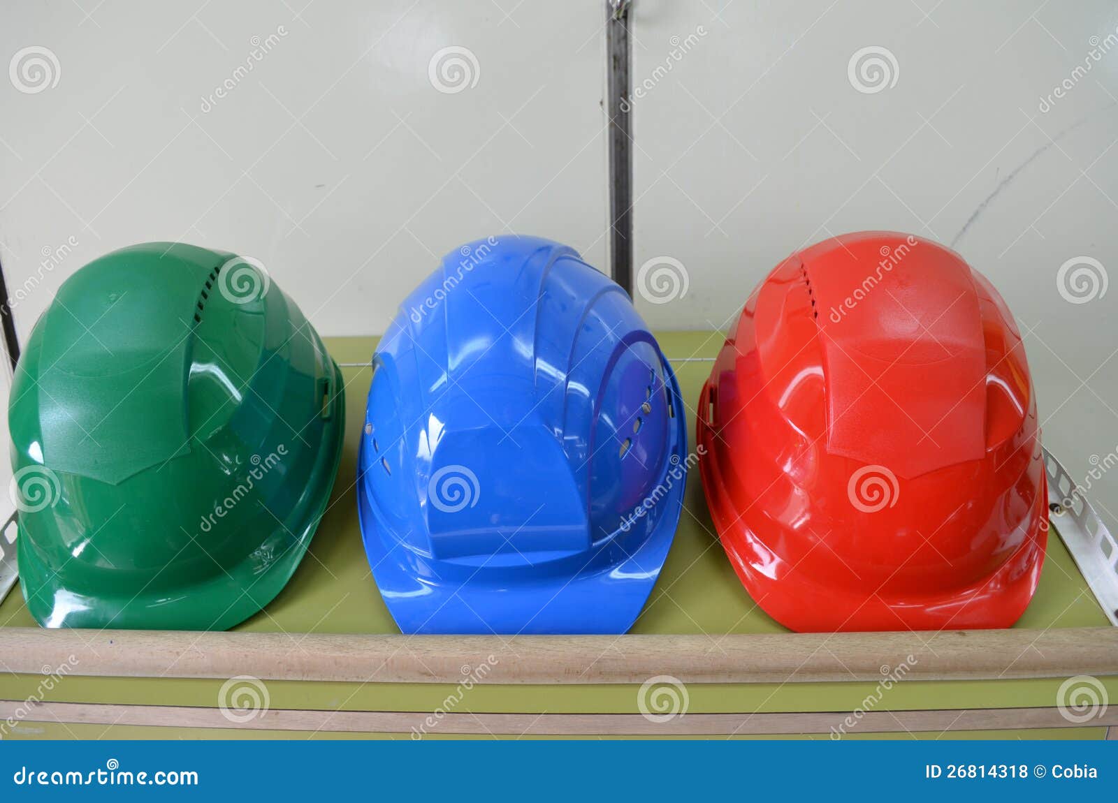 Hard Hats Lying On A Storage Rack Stock Photo - Image of ...